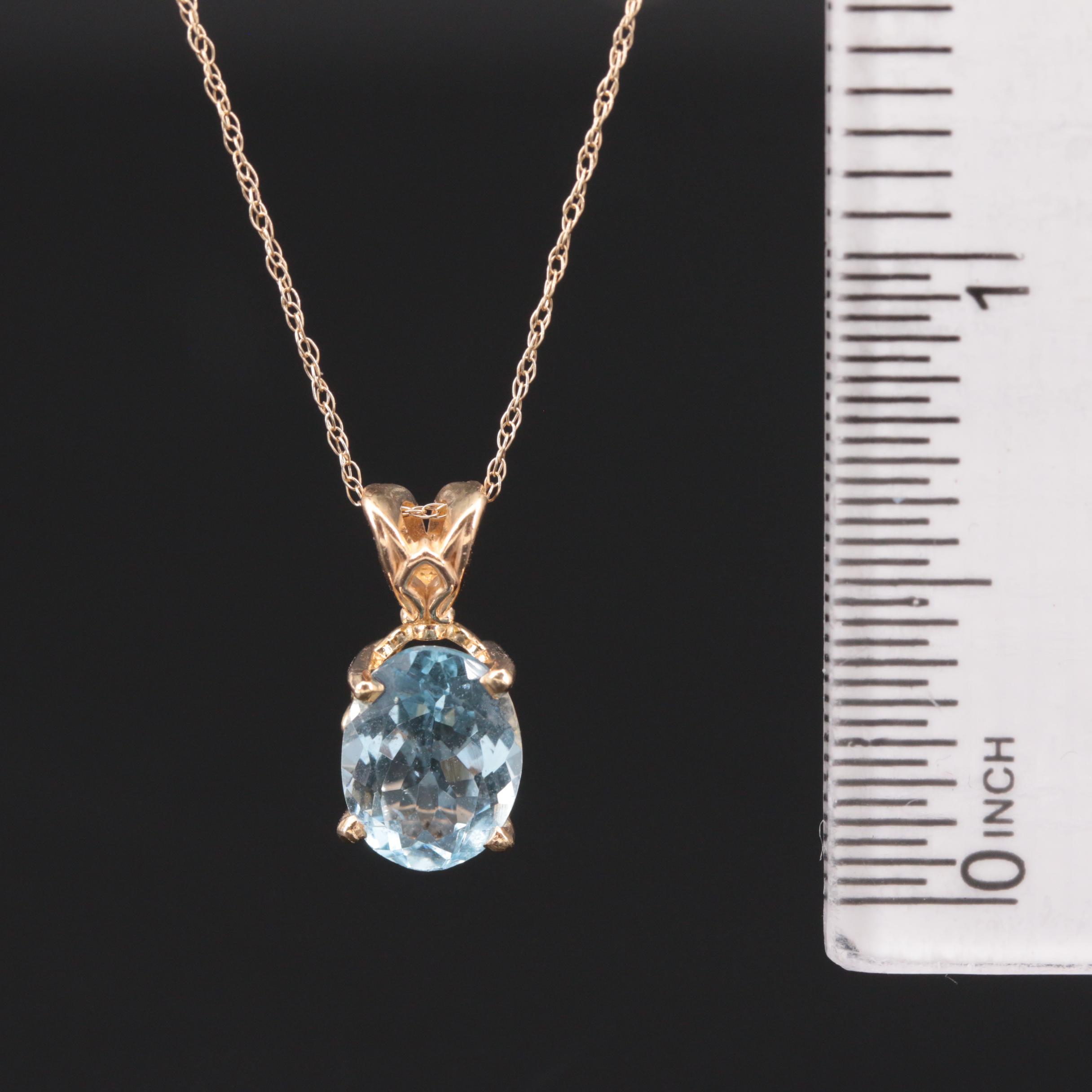 14K Yellow Gold Aquamarine Pendant on 10K Yellow Gold Rope Chain