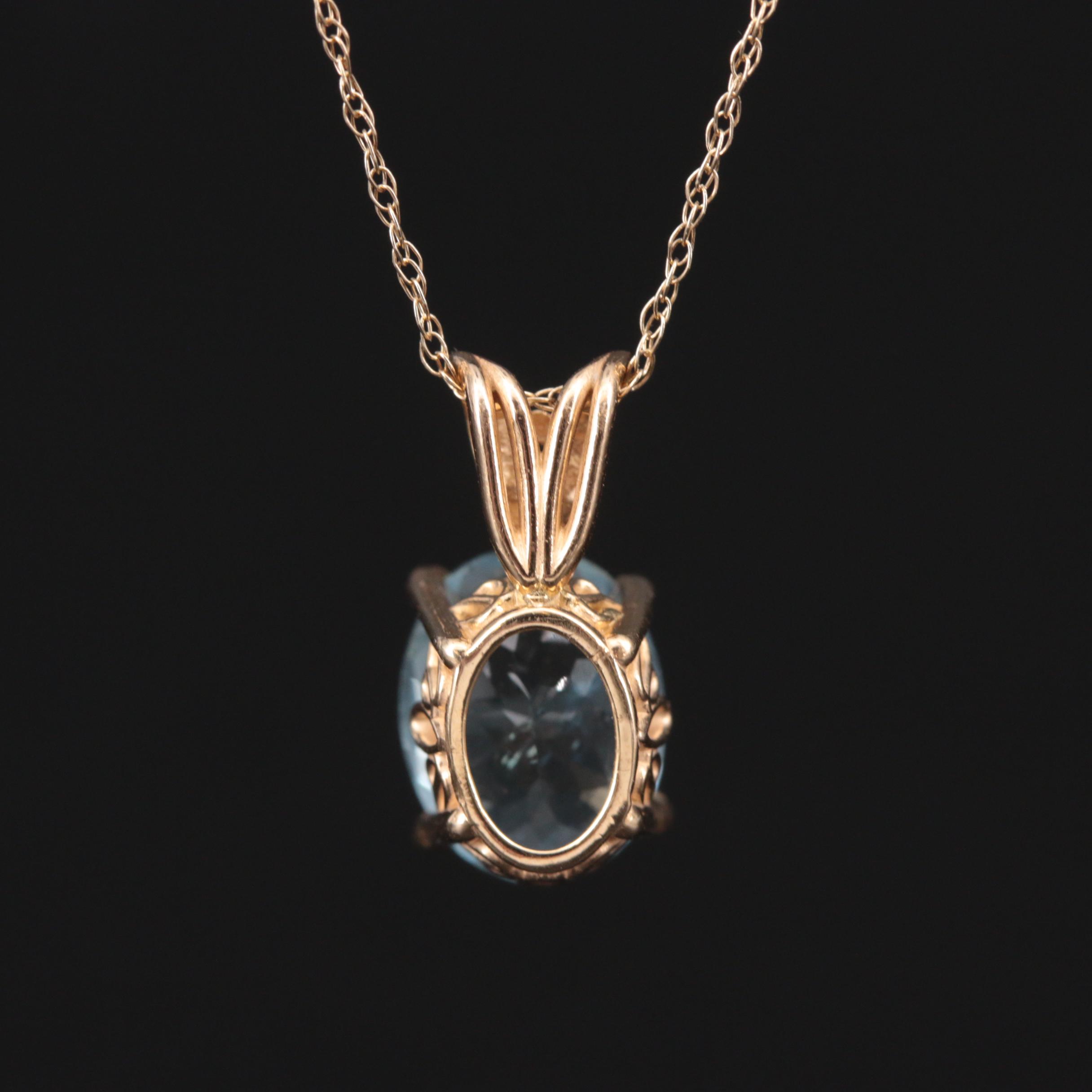 14K Yellow Gold Aquamarine Pendant on 10K Yellow Gold Rope Chain