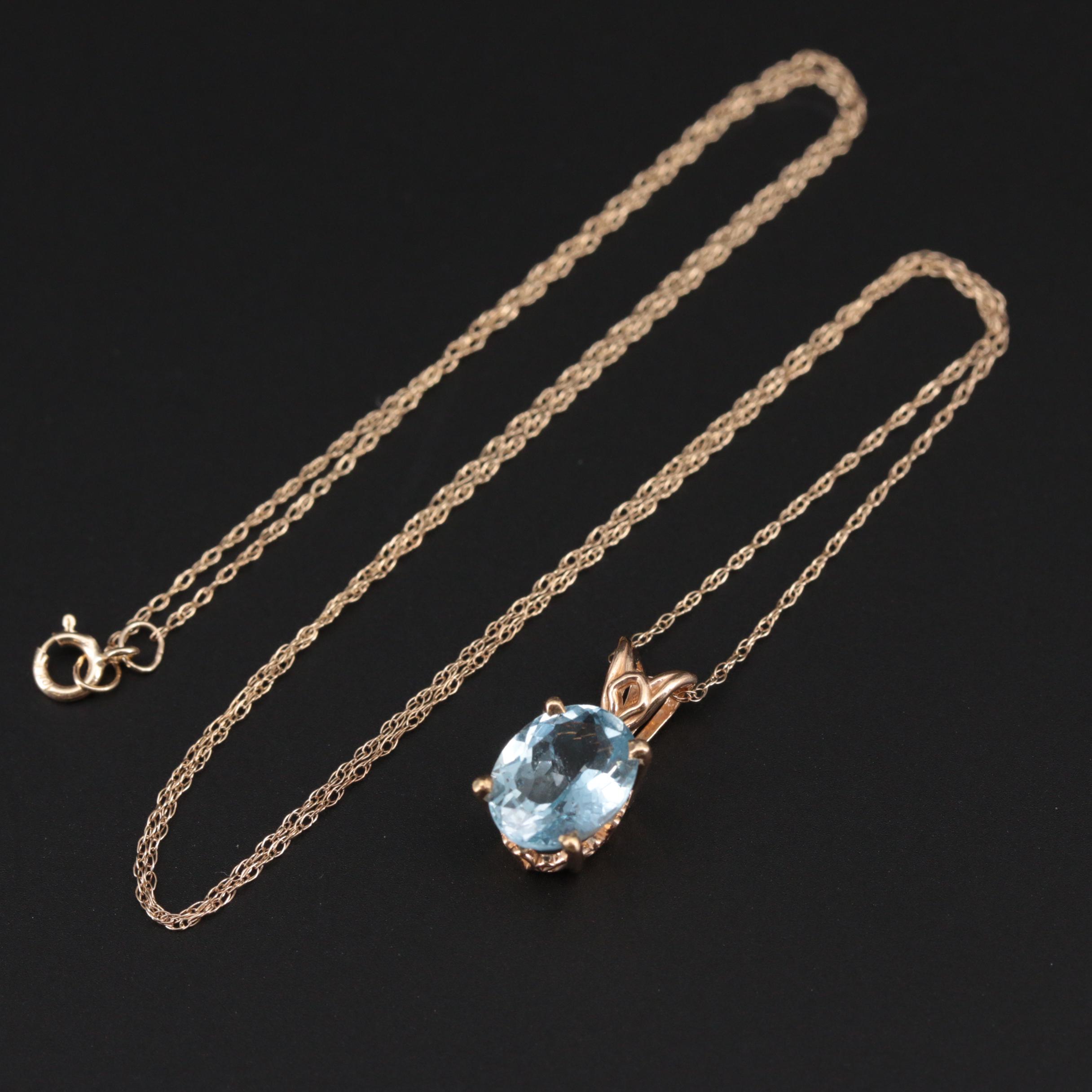 14K Yellow Gold Aquamarine Pendant on 10K Yellow Gold Rope Chain