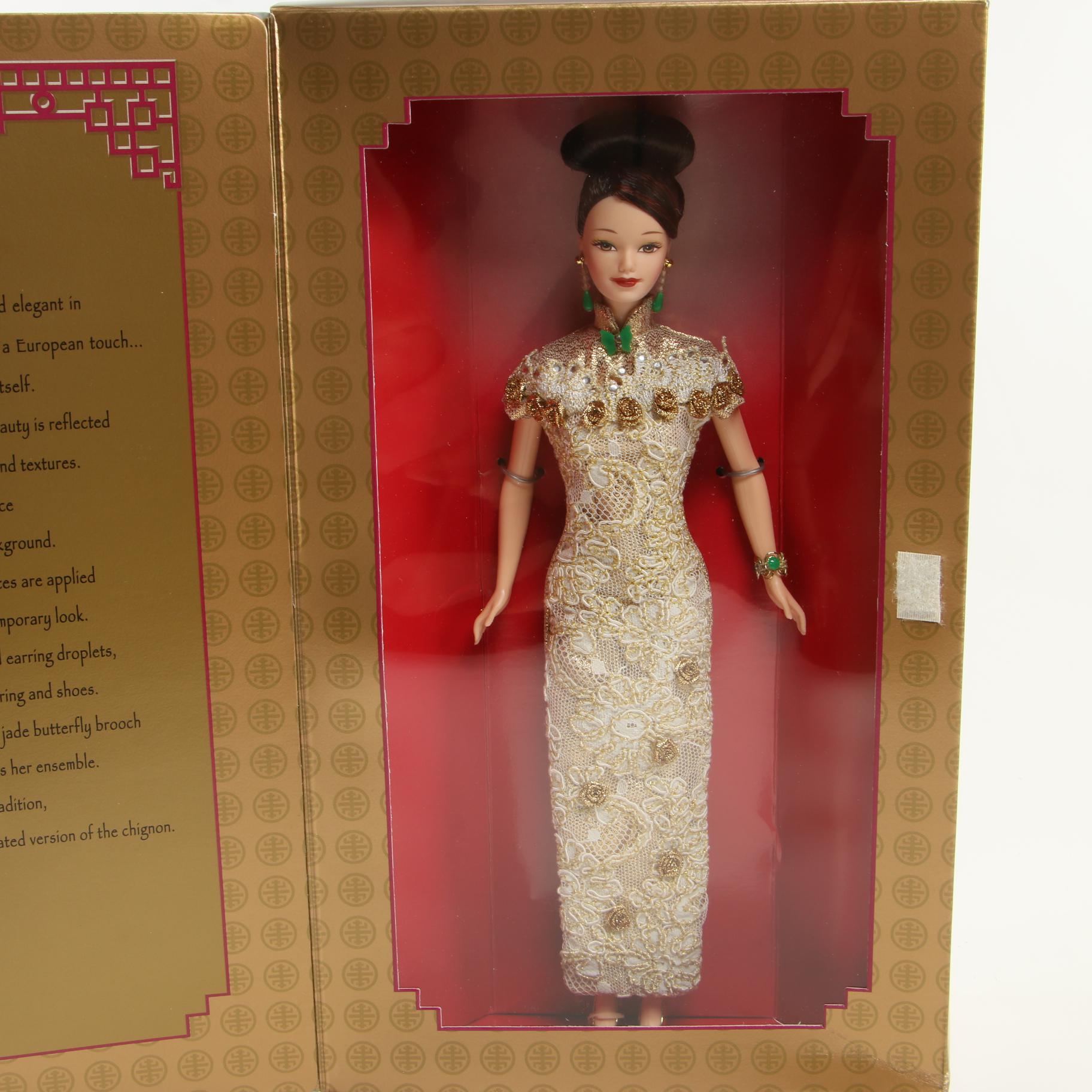 "Pink Ice" and "Golden Qi-Pao" Barbie Dolls With Original Boxes, 1990s