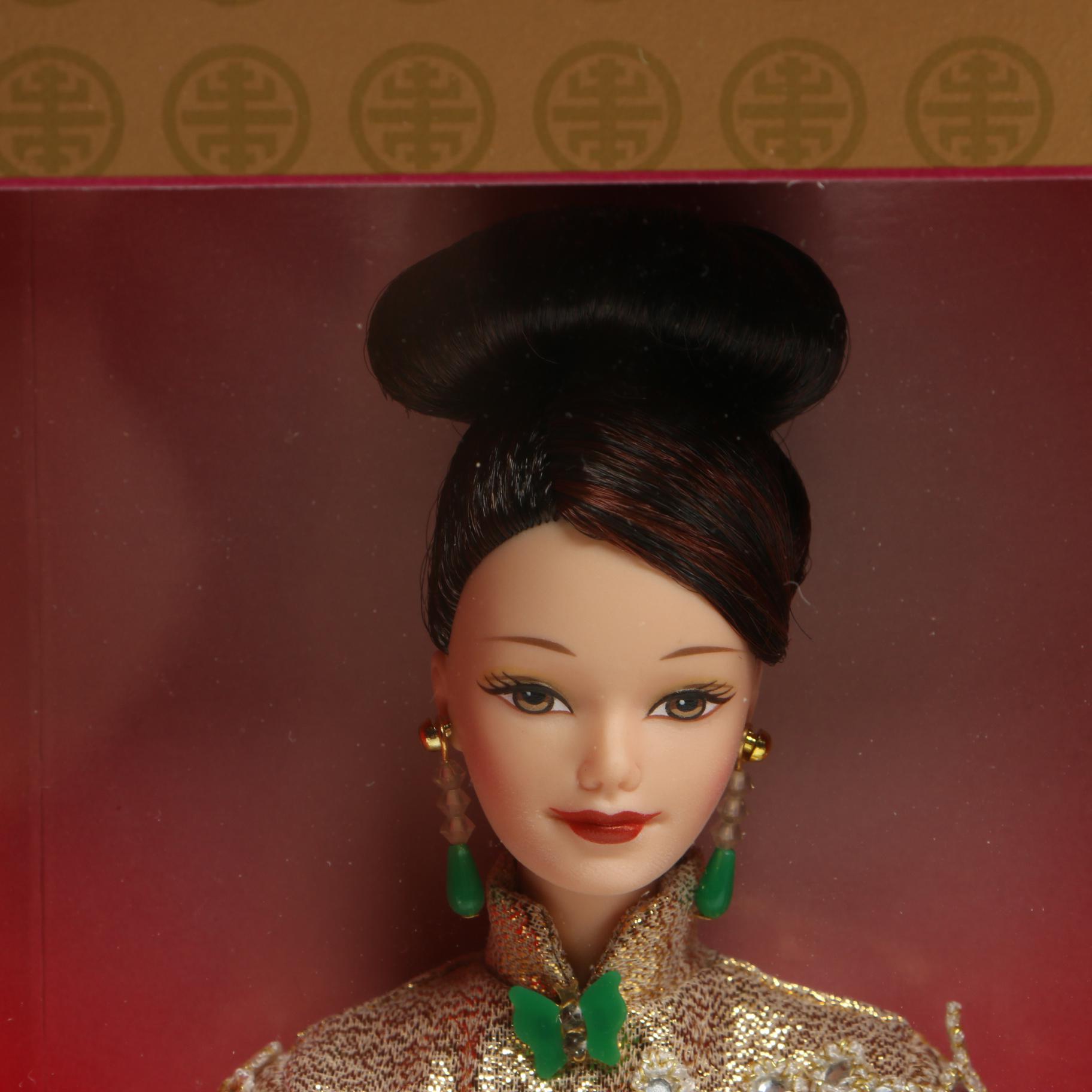 "Pink Ice" and "Golden Qi-Pao" Barbie Dolls With Original Boxes, 1990s