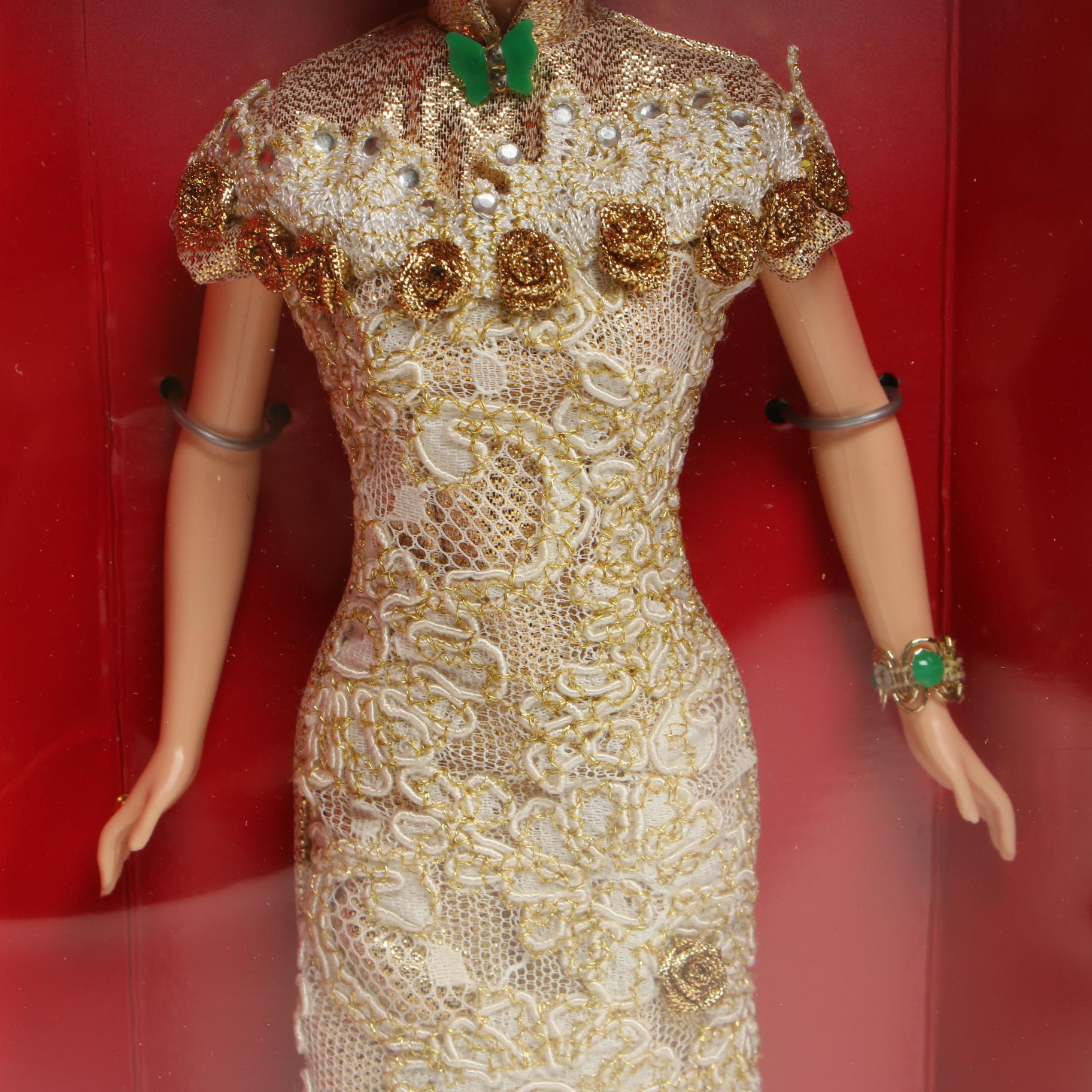 "Pink Ice" and "Golden Qi-Pao" Barbie Dolls With Original Boxes, 1990s