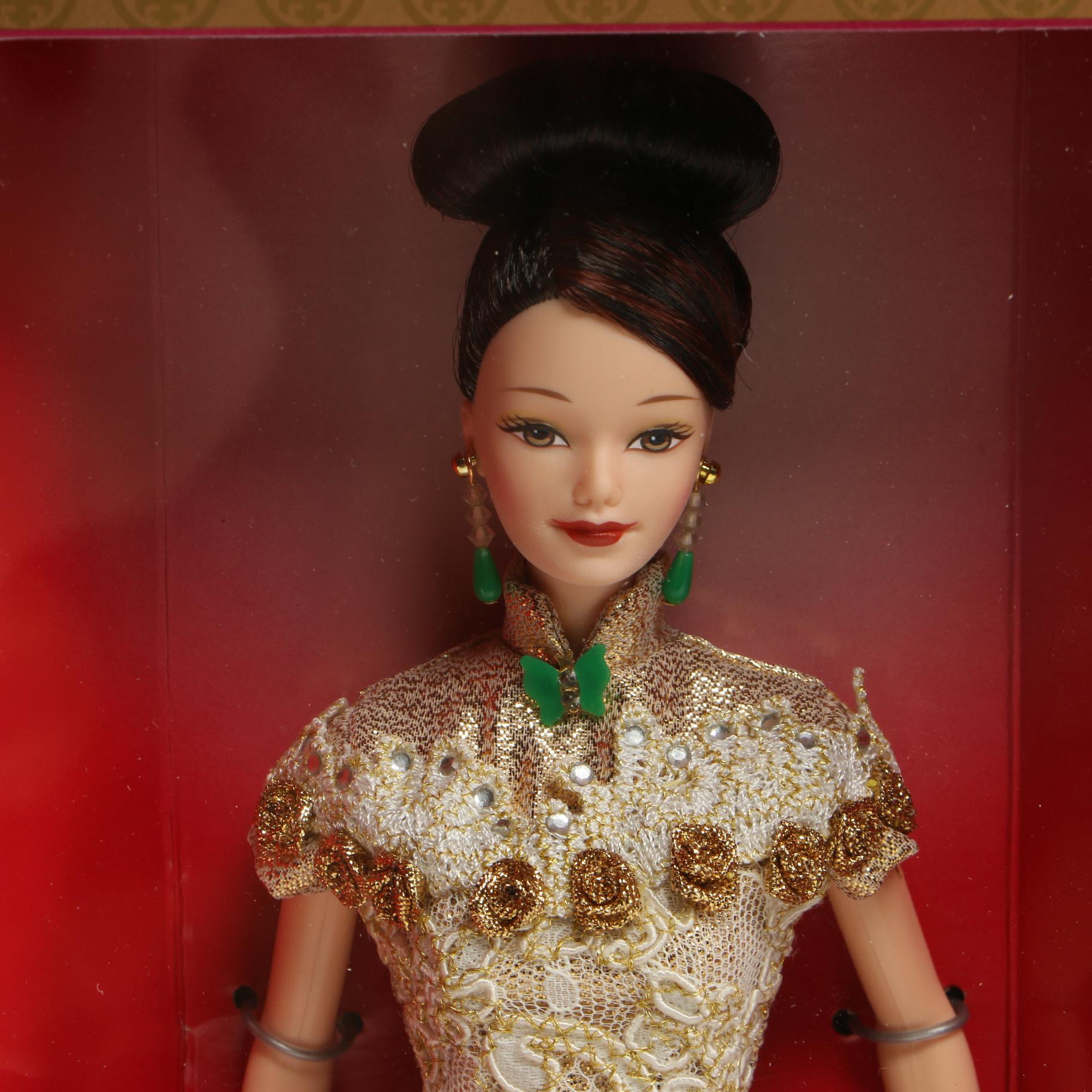 "Pink Ice" and "Golden Qi-Pao" Barbie Dolls With Original Boxes, 1990s