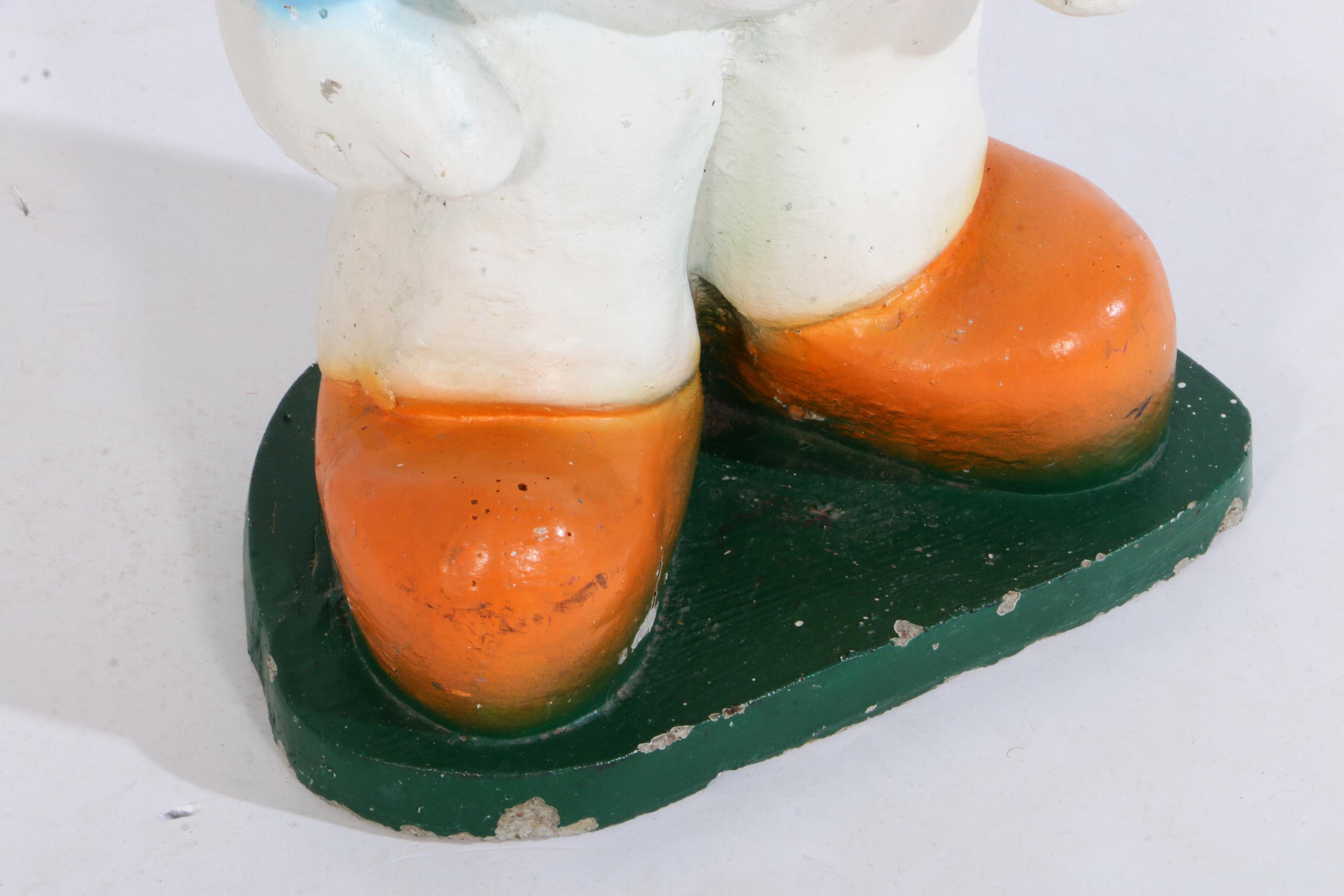 Cast Concrete Donald Duck Sculpture