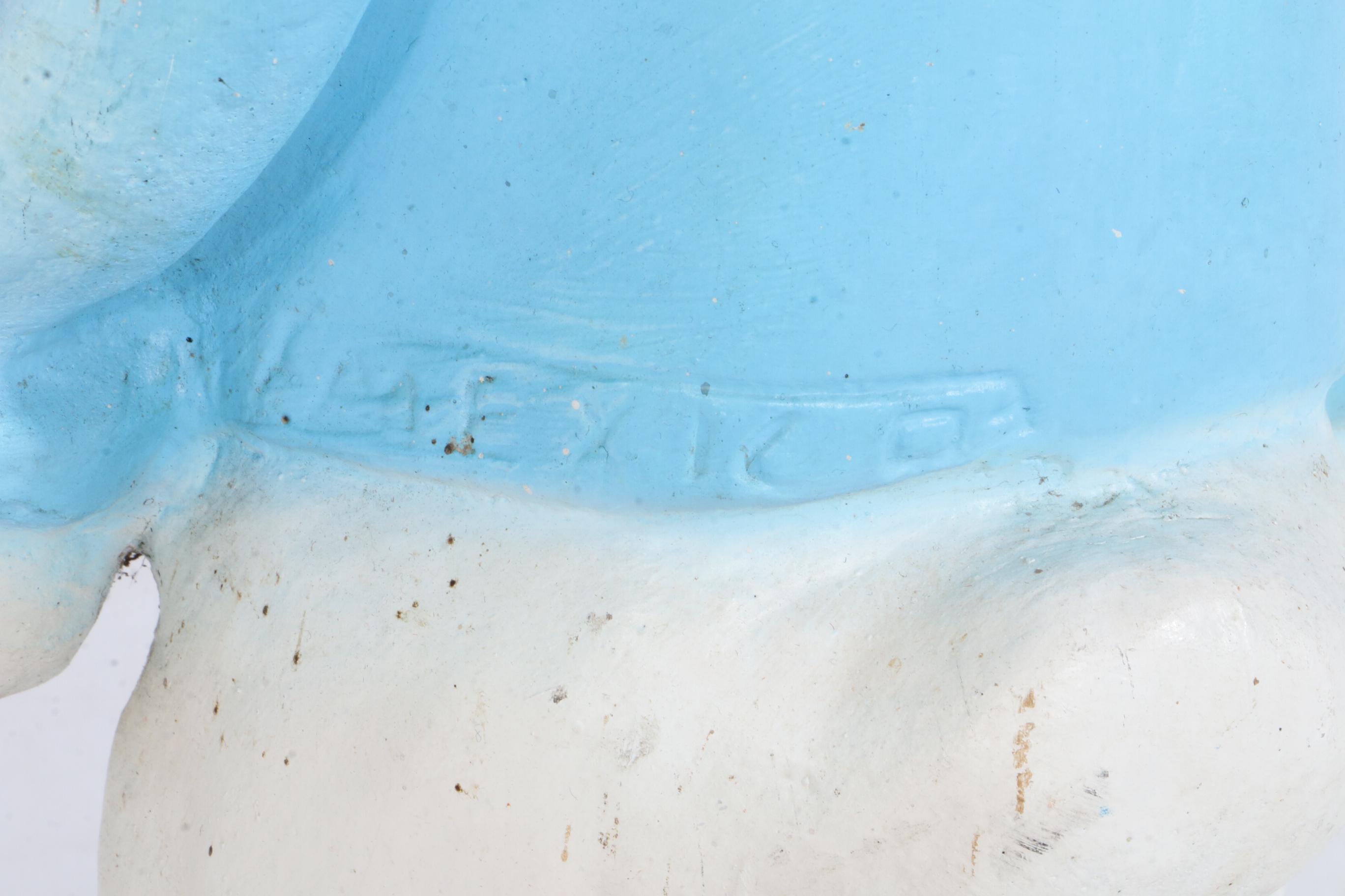 Cast Concrete Donald Duck Sculpture