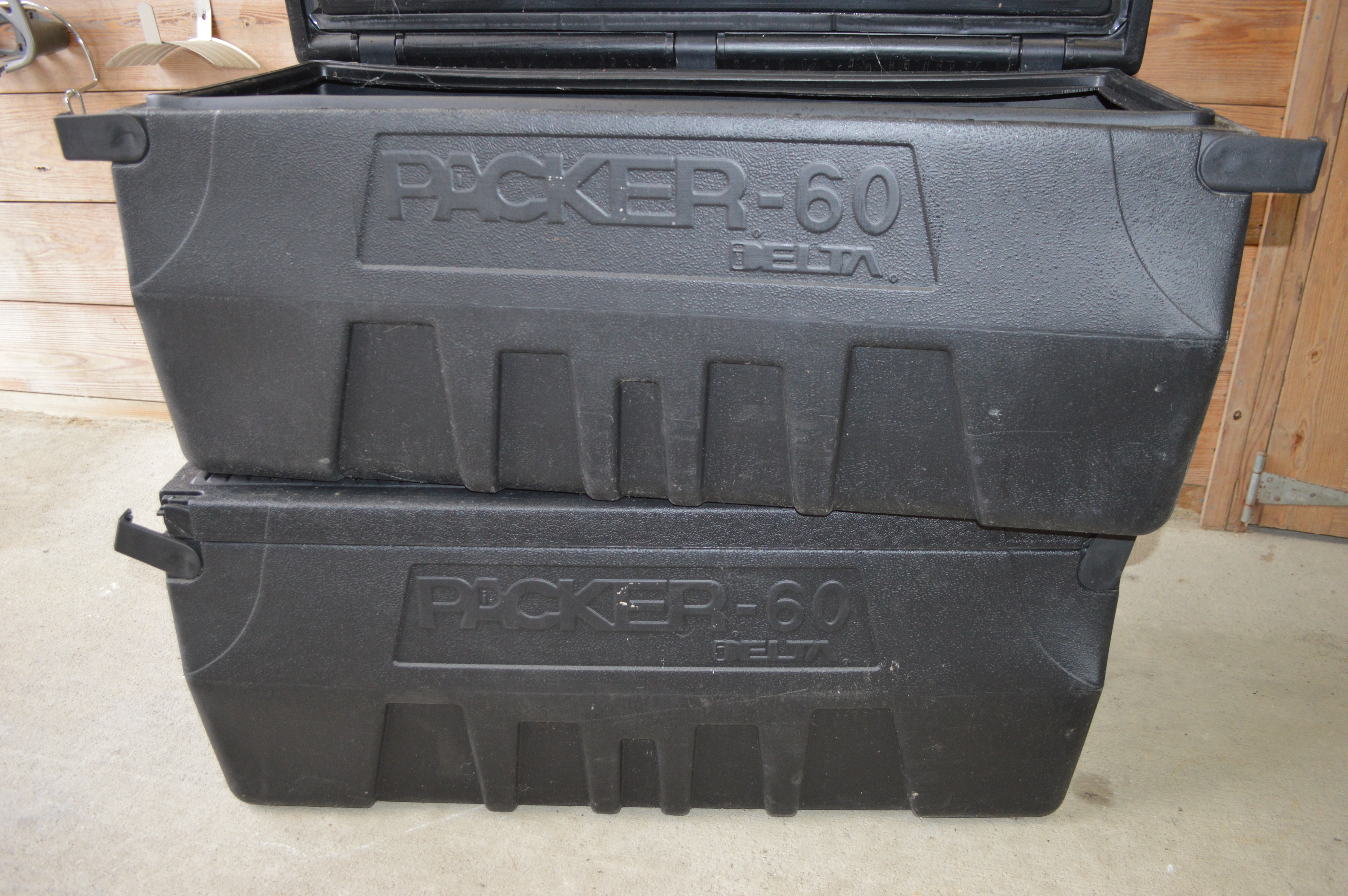 Pair of Delta Packer-60 Plastic Truck Tool Boxes