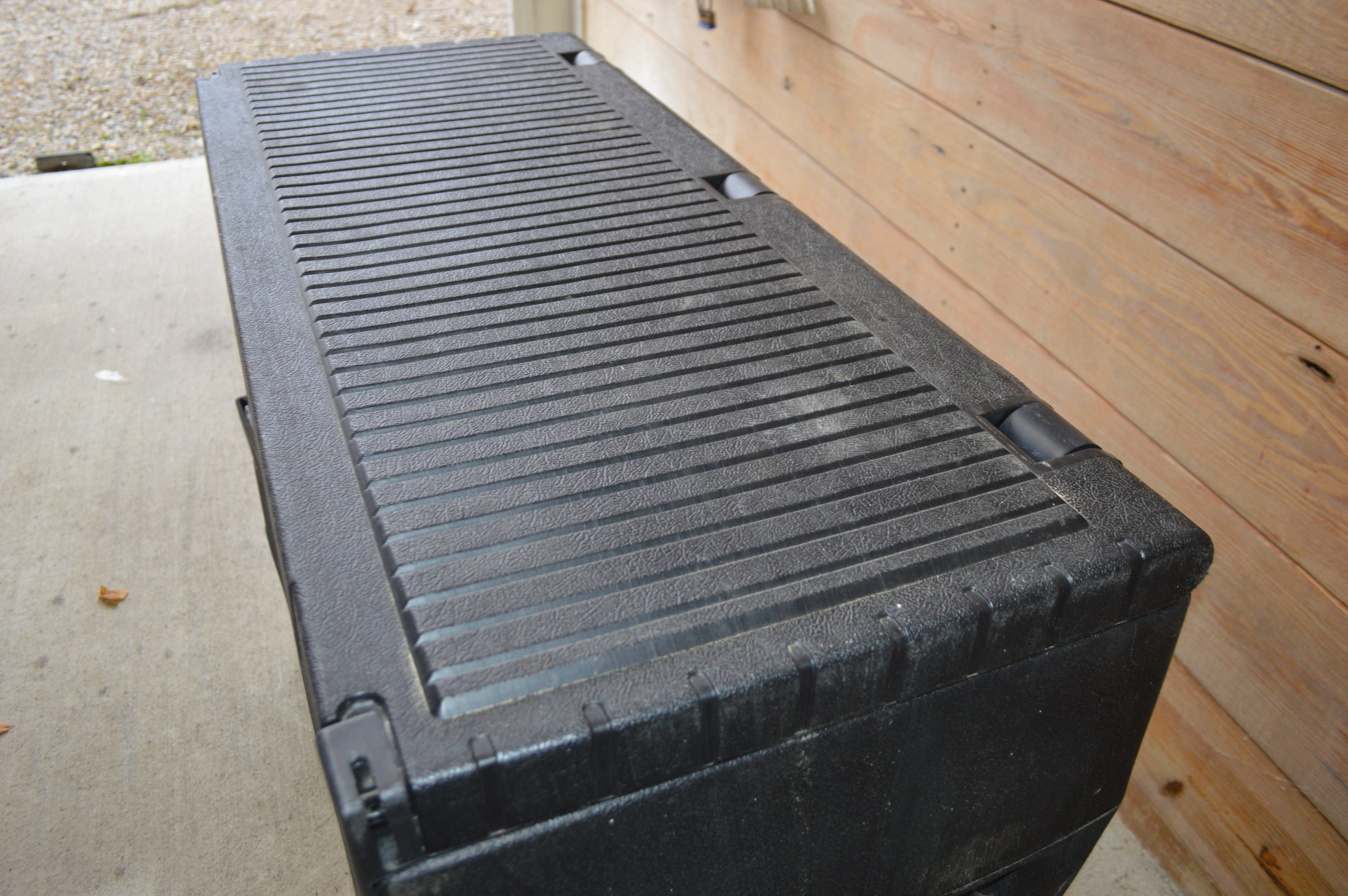 Pair of Delta Packer-60 Plastic Truck Tool Boxes