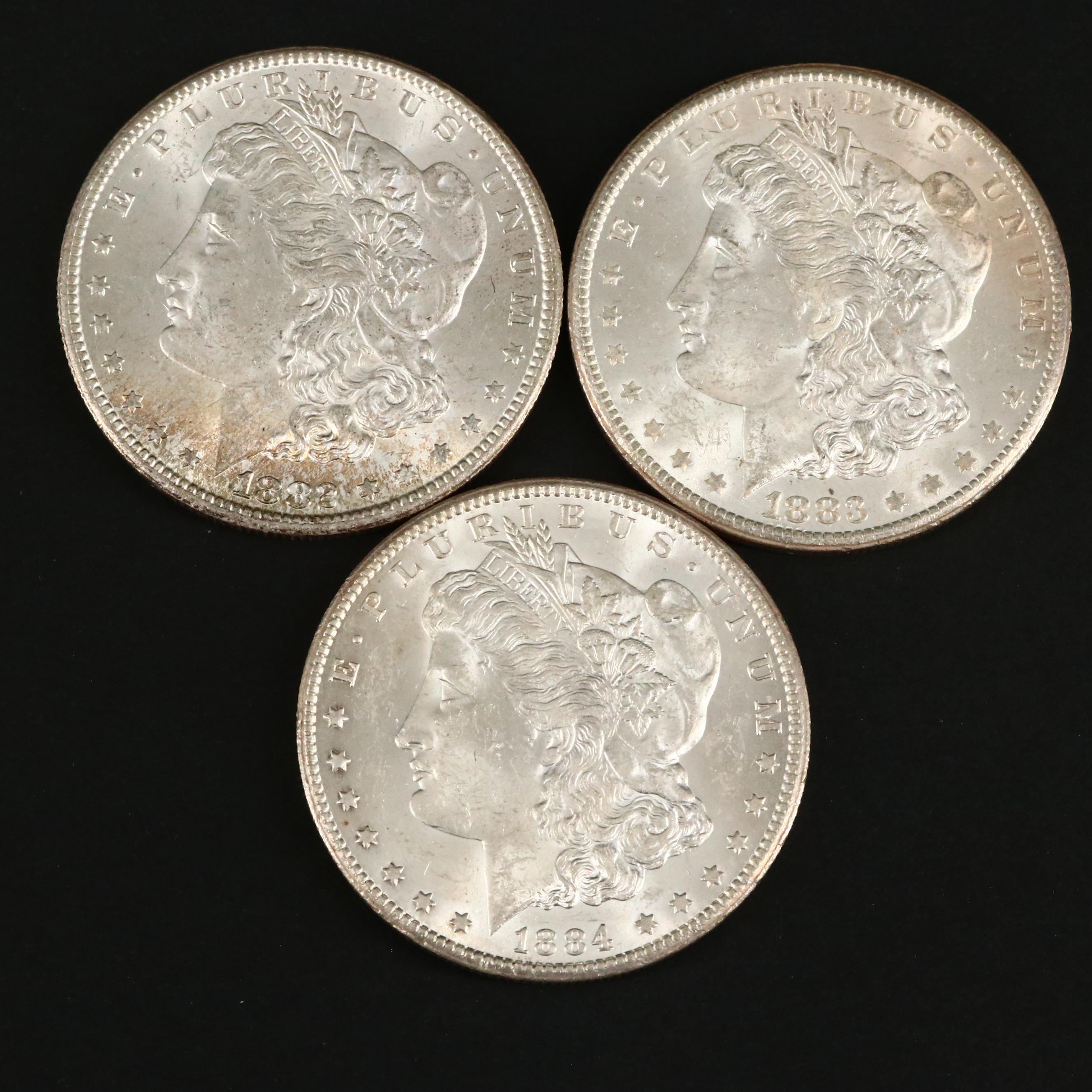 Three Uncirculated Carson City Morgan Silver Dollars