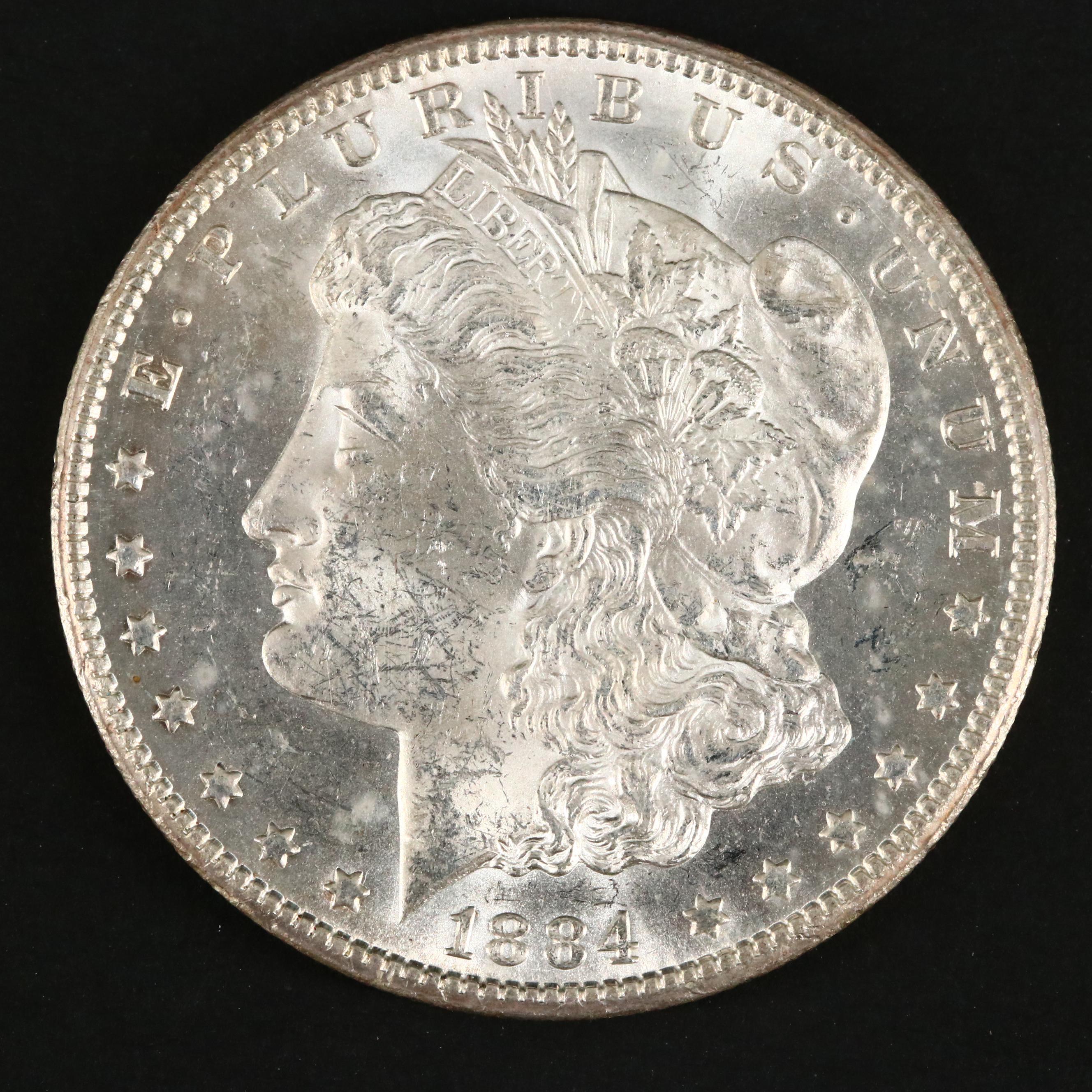 Three Uncirculated Carson City Morgan Silver Dollars