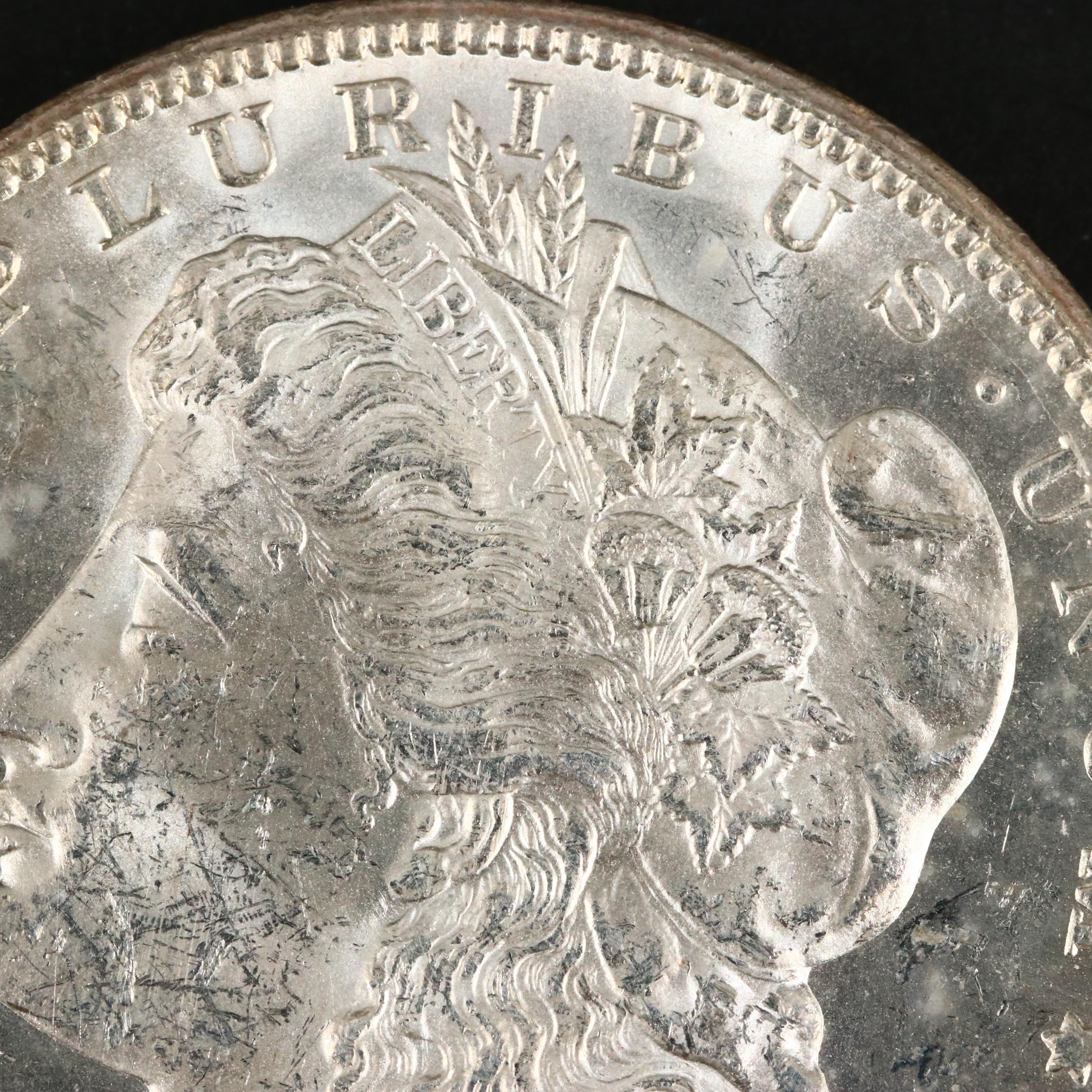 Three Uncirculated Carson City Morgan Silver Dollars