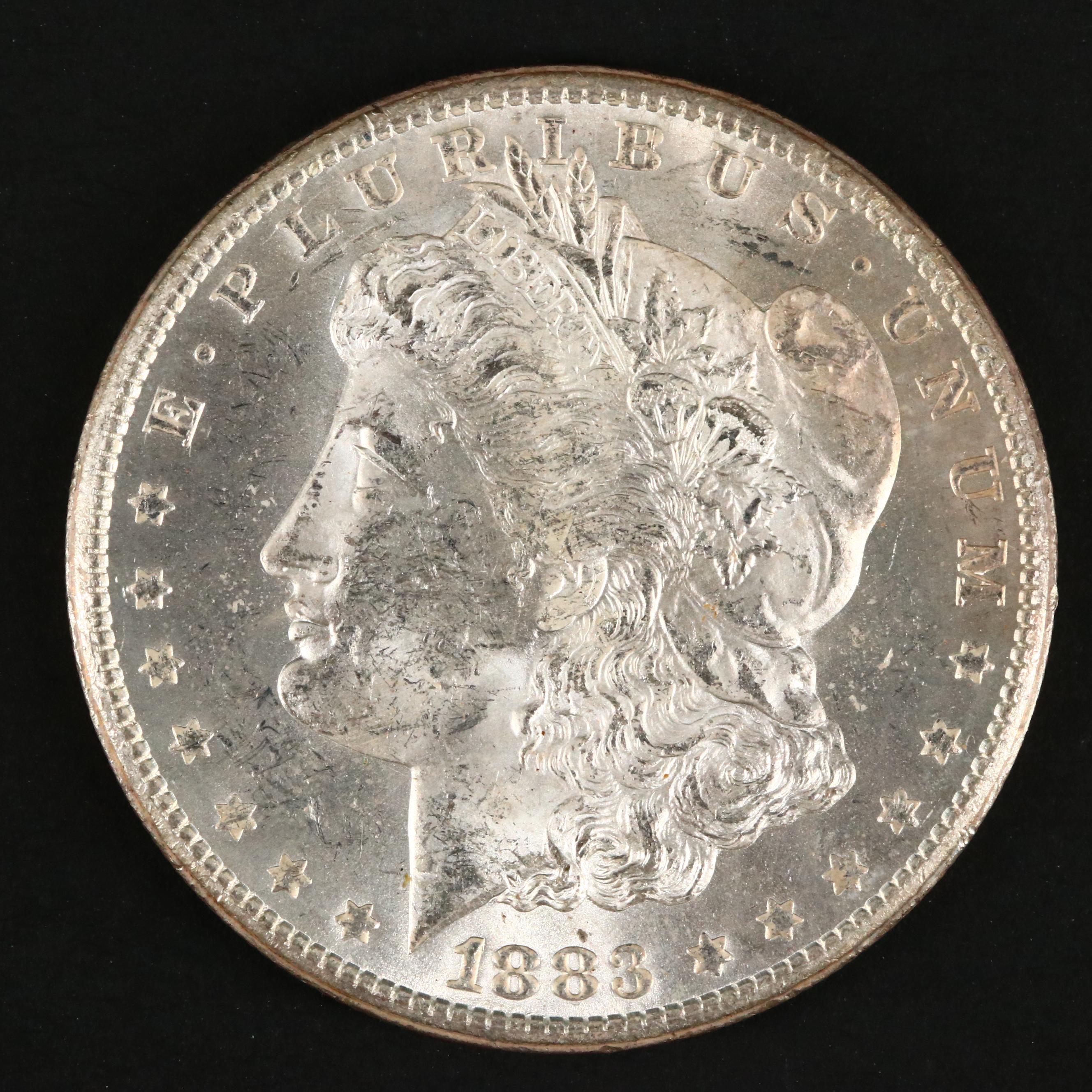 Three Uncirculated Carson City Morgan Silver Dollars