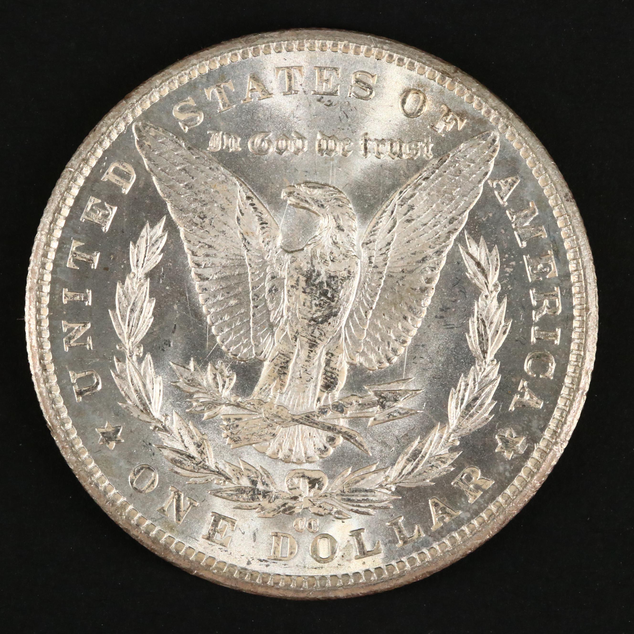 Three Uncirculated Carson City Morgan Silver Dollars