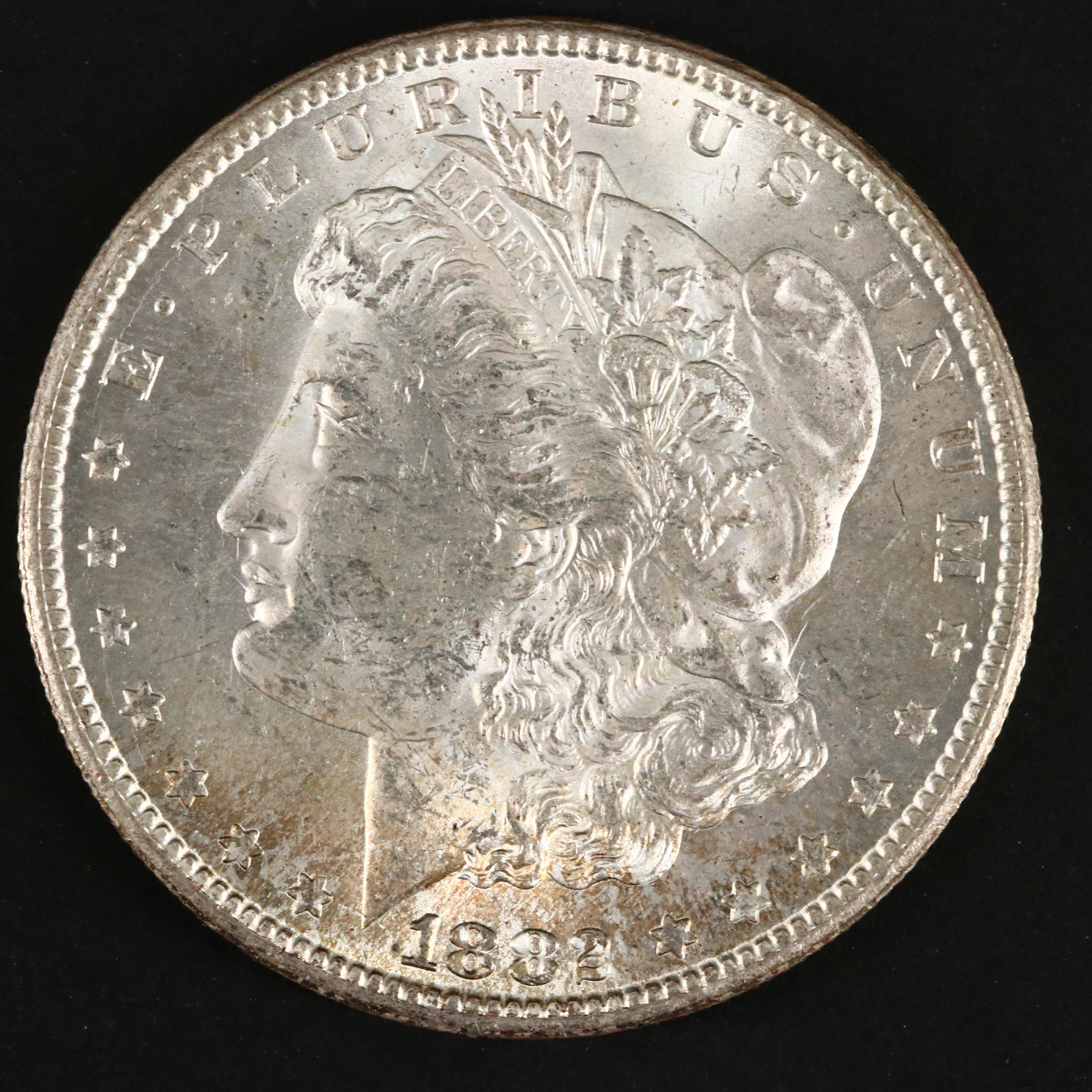 Three Uncirculated Carson City Morgan Silver Dollars