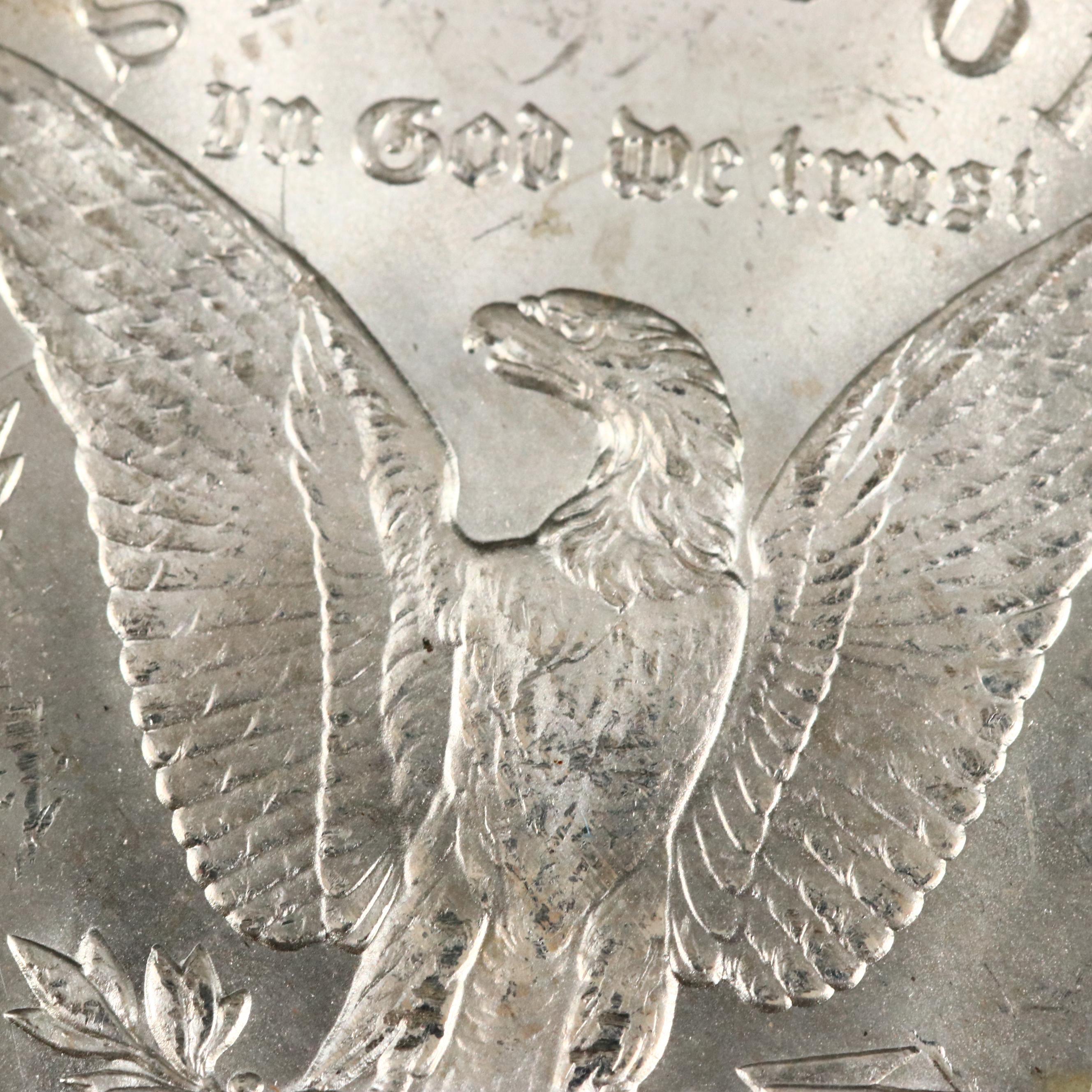 Three Uncirculated Carson City Morgan Silver Dollars