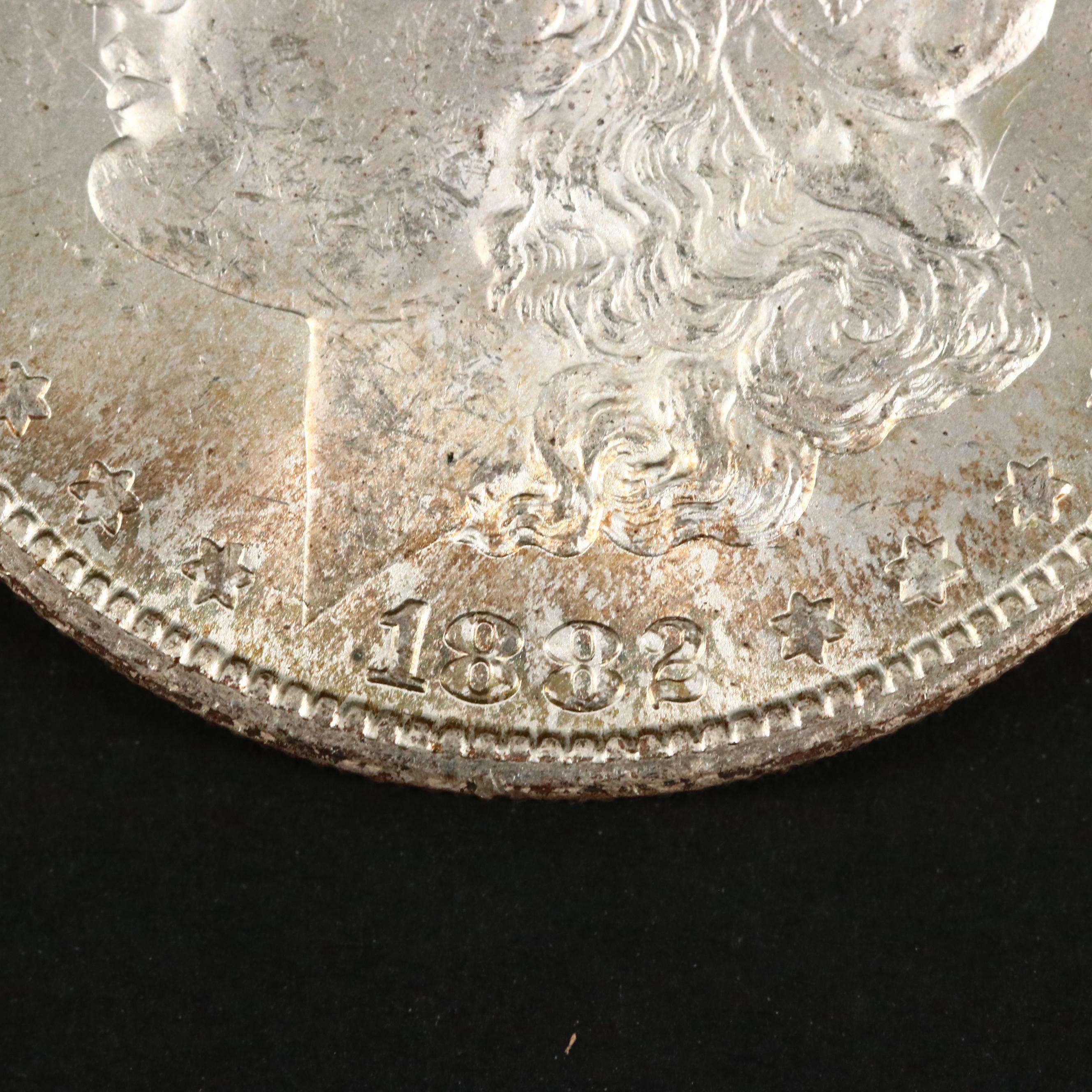 Three Uncirculated Carson City Morgan Silver Dollars