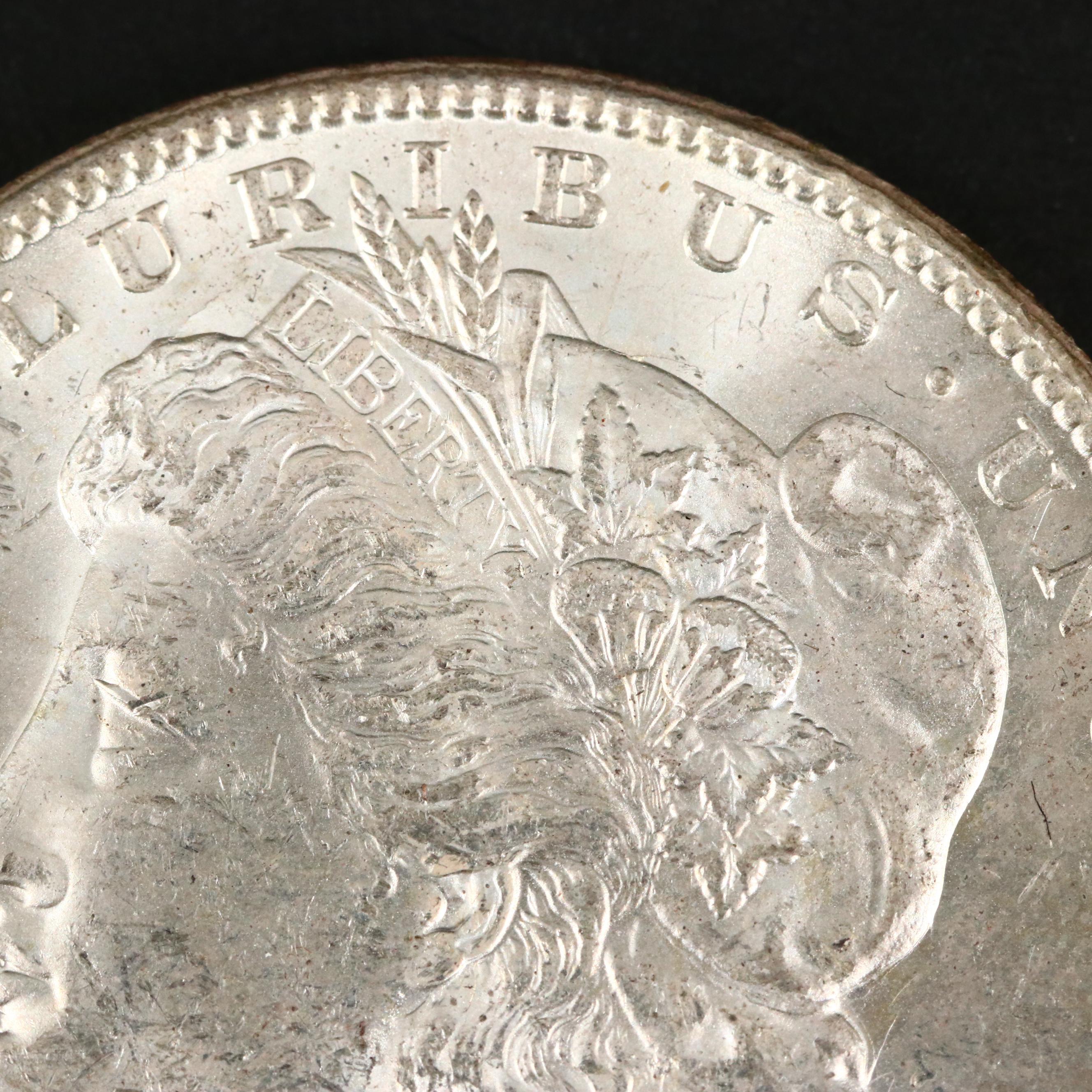 Three Uncirculated Carson City Morgan Silver Dollars