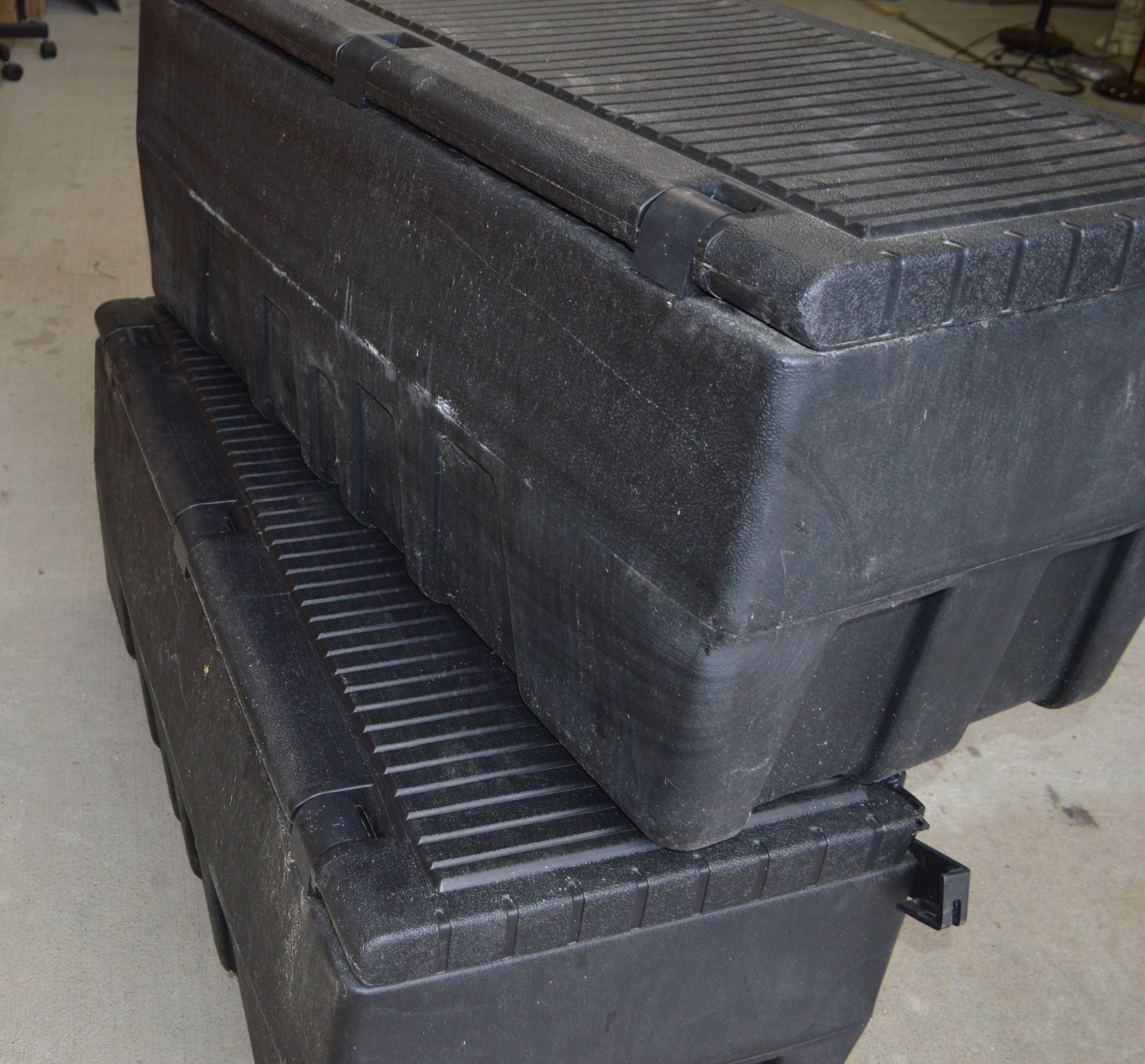 Pair of Delta Packer-60 Plastic Truck Tool Boxes