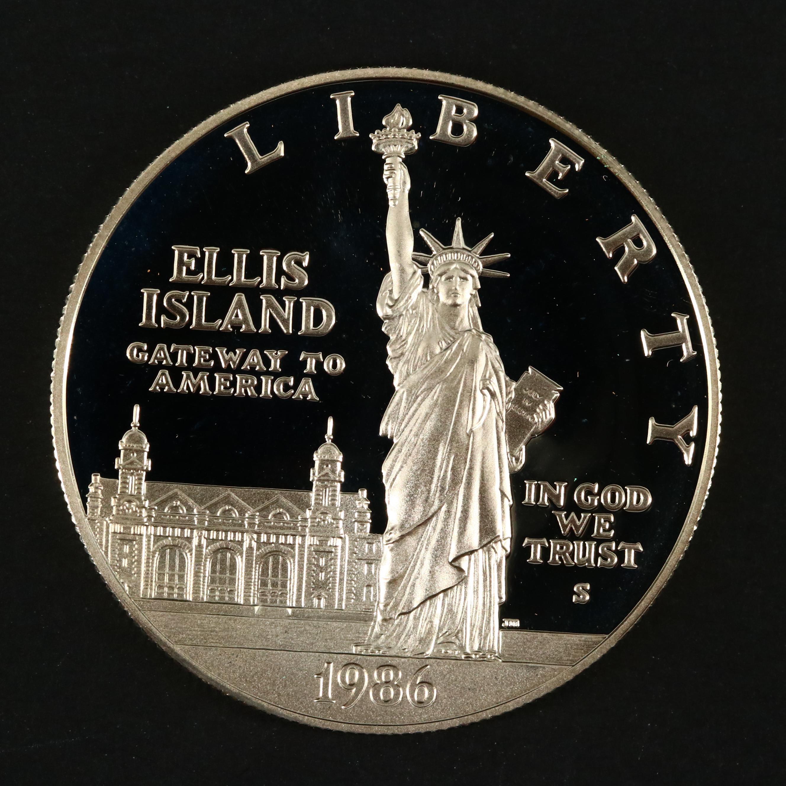 Three Modern Proof Commemorative Silver Dollars and a Proof Half Dollar