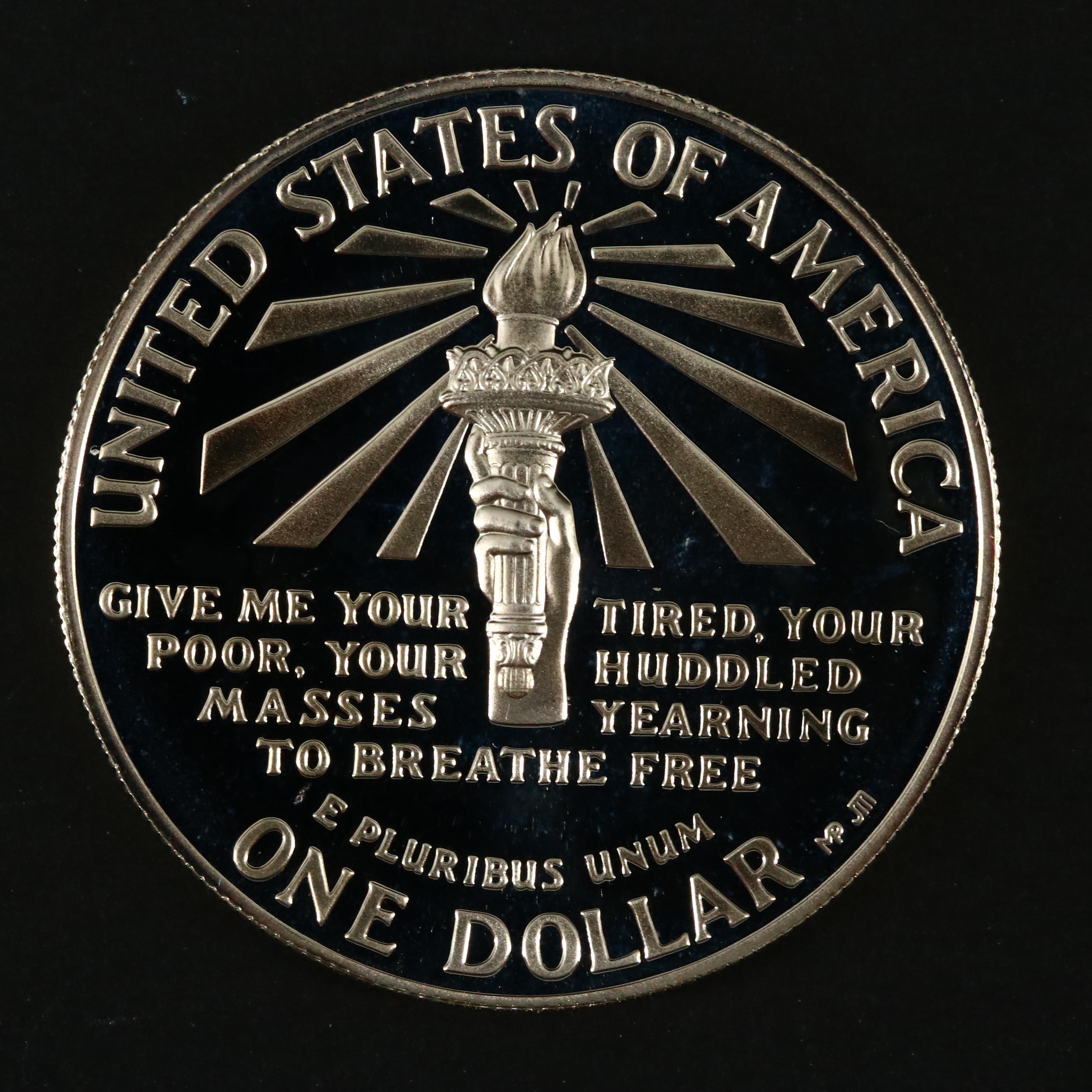 Three Modern Proof Commemorative Silver Dollars and a Proof Half Dollar