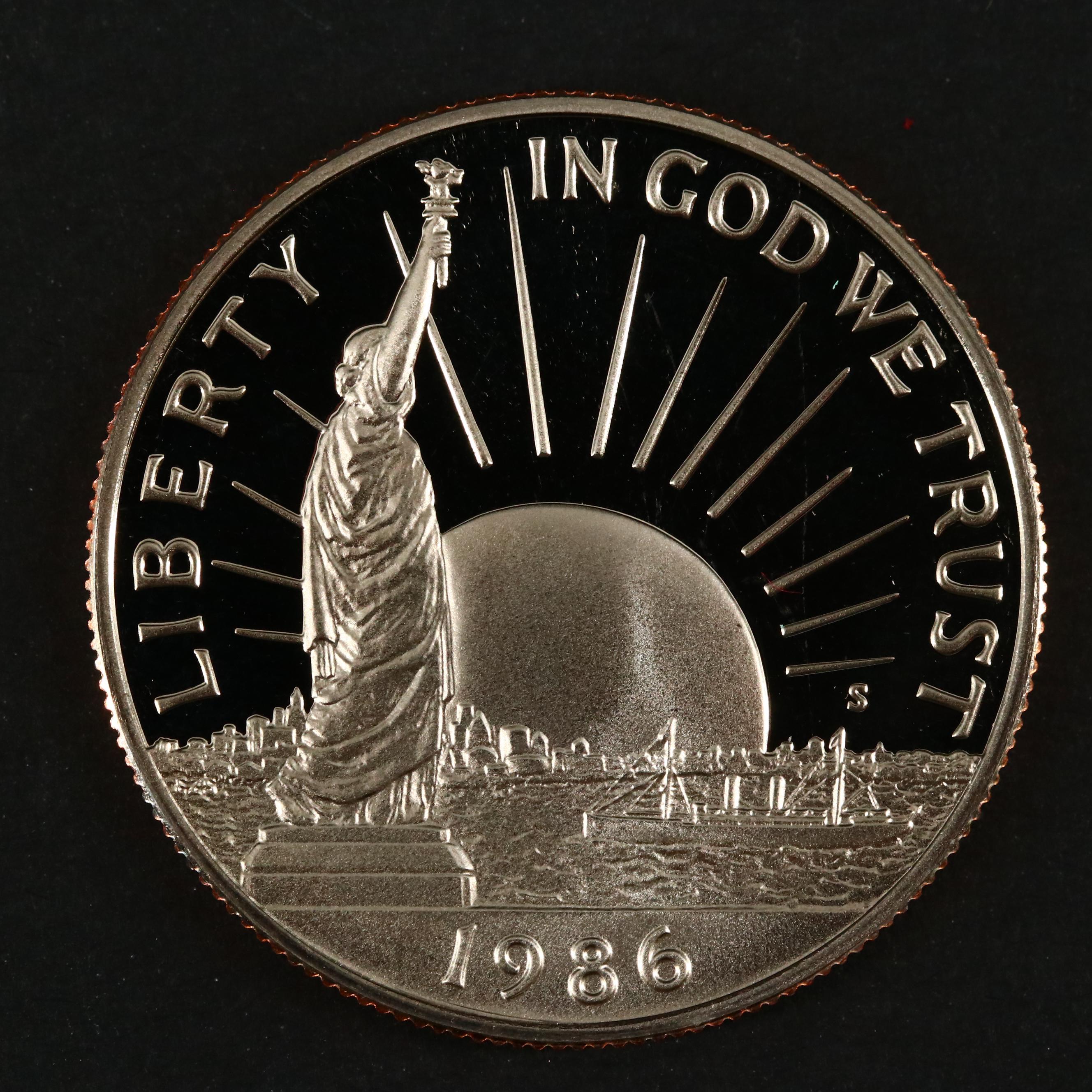 Three Modern Proof Commemorative Silver Dollars and a Proof Half Dollar