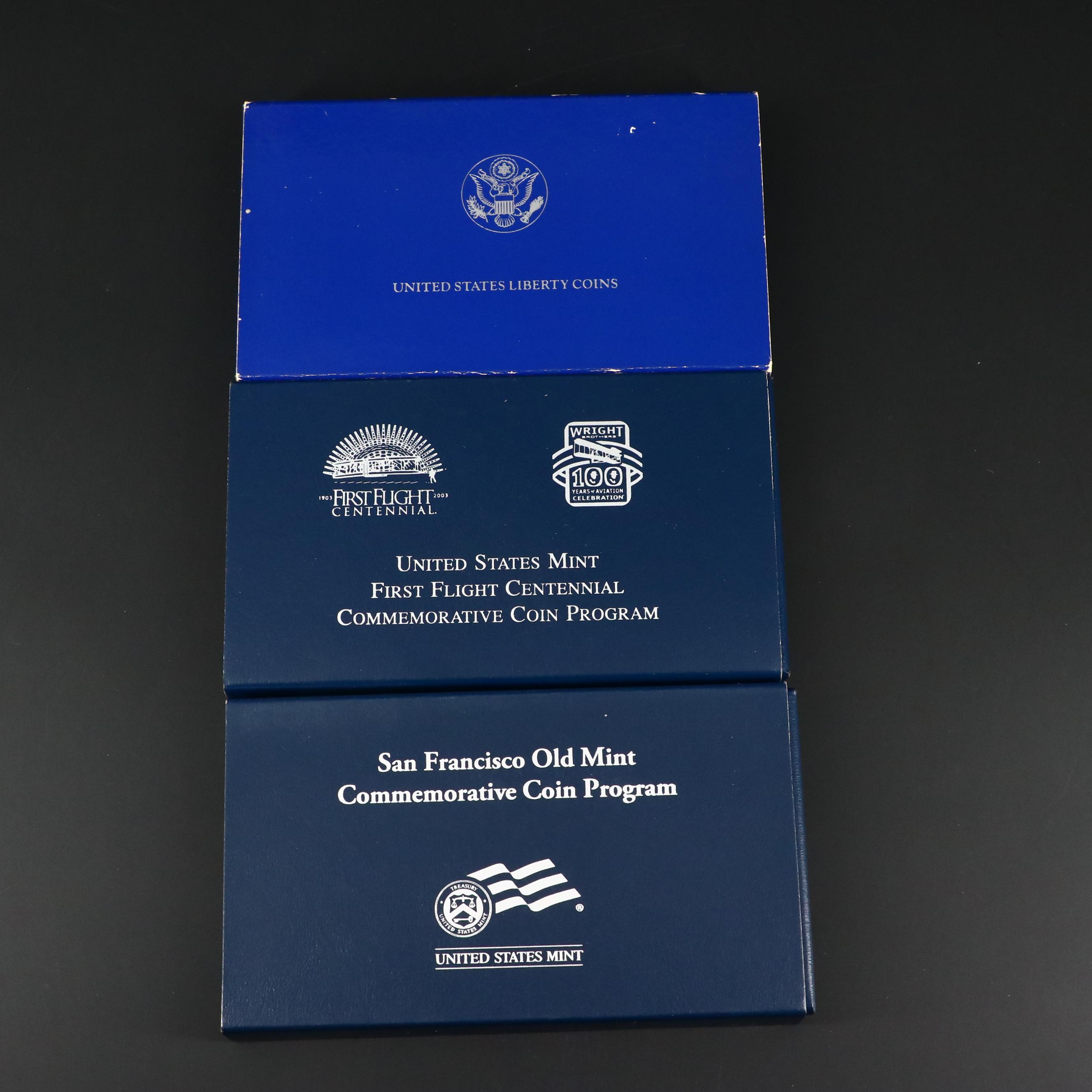 Three Modern Proof Commemorative Silver Dollars and a Proof Half Dollar