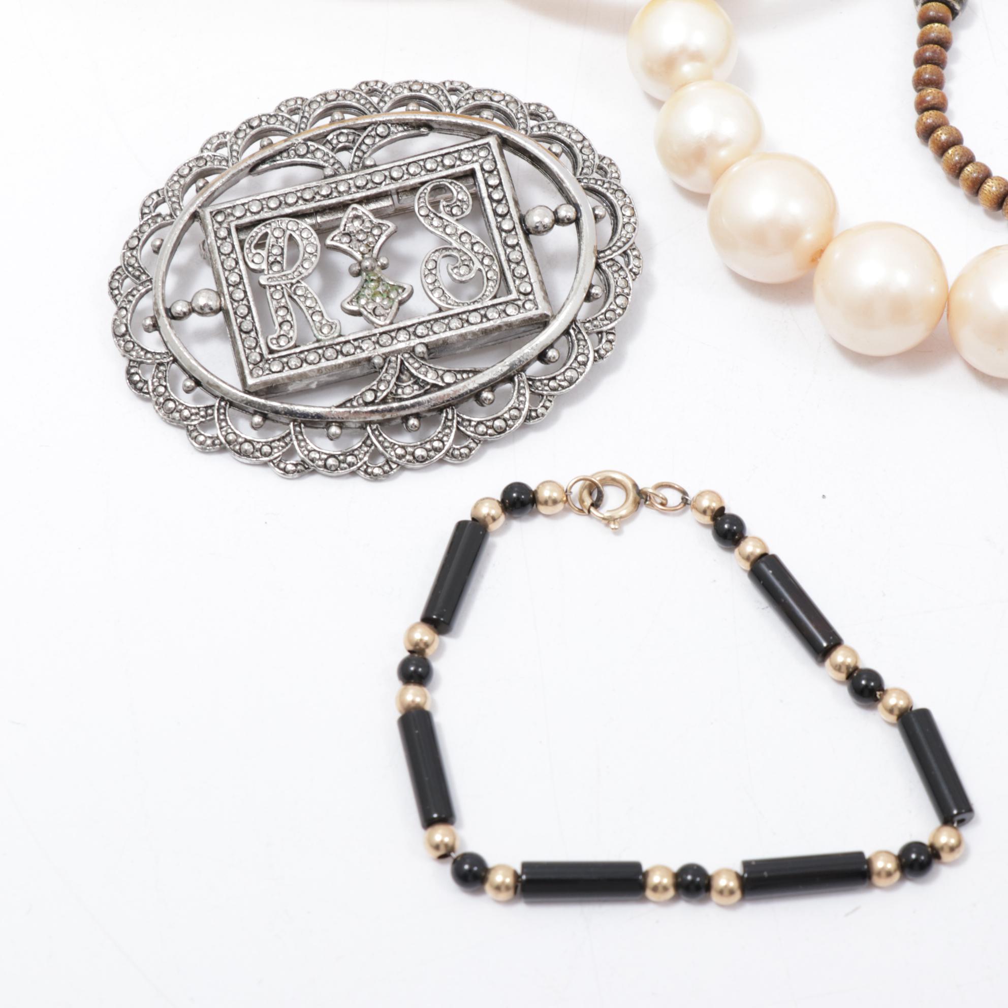 Bakelite Bracelets, Miriam Haskell Brooch, Coach Key Chain and More Jewelry