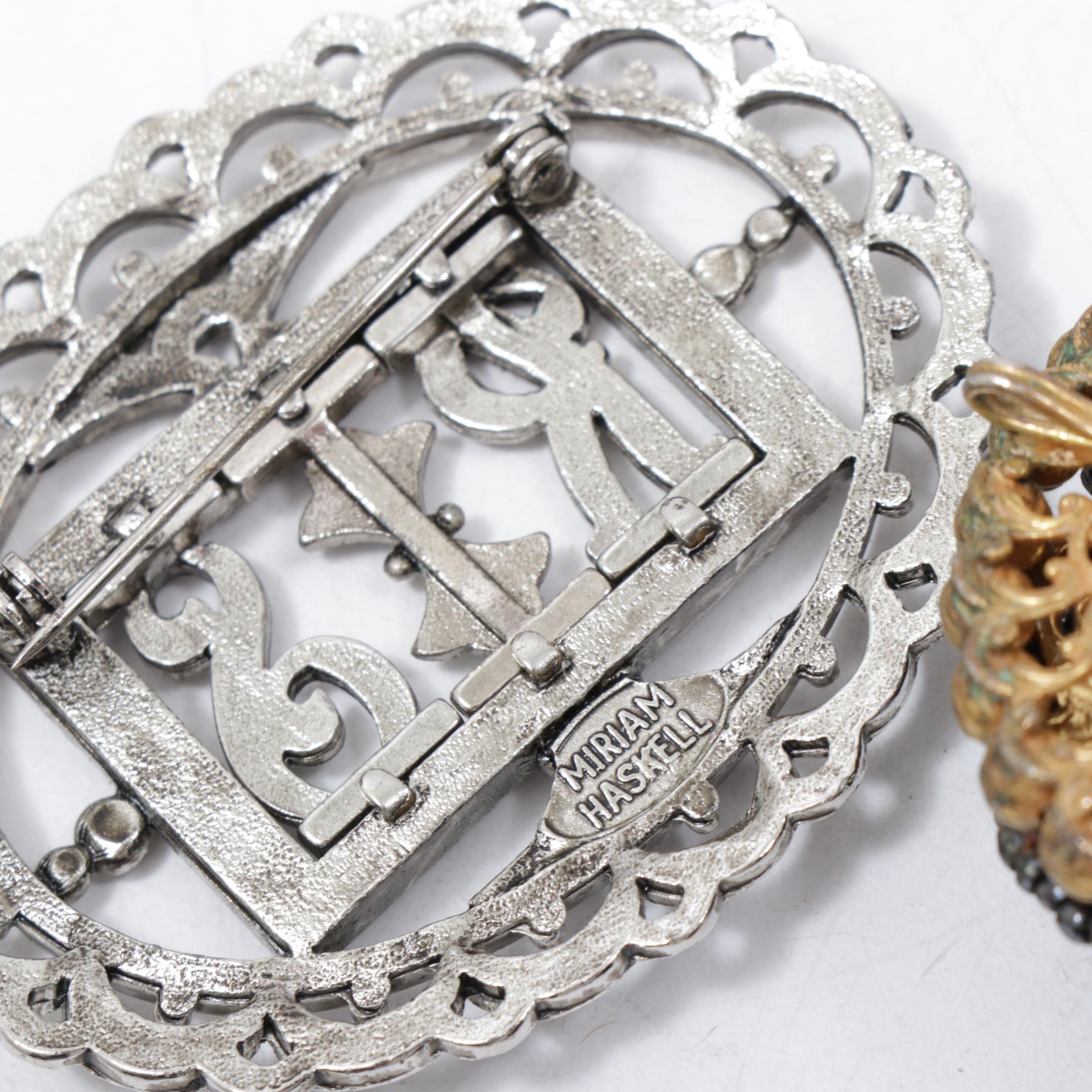 Bakelite Bracelets, Miriam Haskell Brooch, Coach Key Chain and More Jewelry