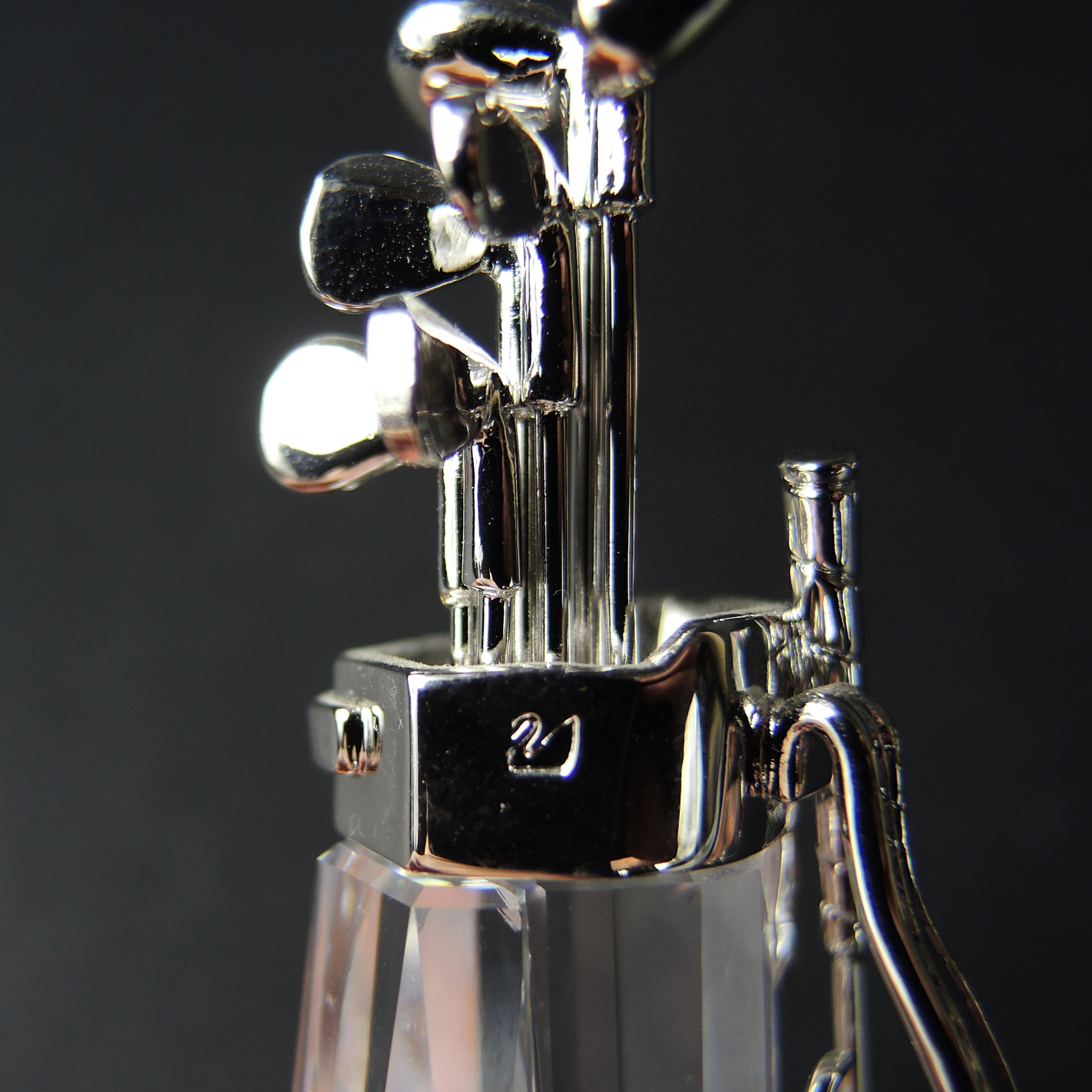 Swarovski Crystal Golf Bag Figurine and Glass Pyramid Paperweight