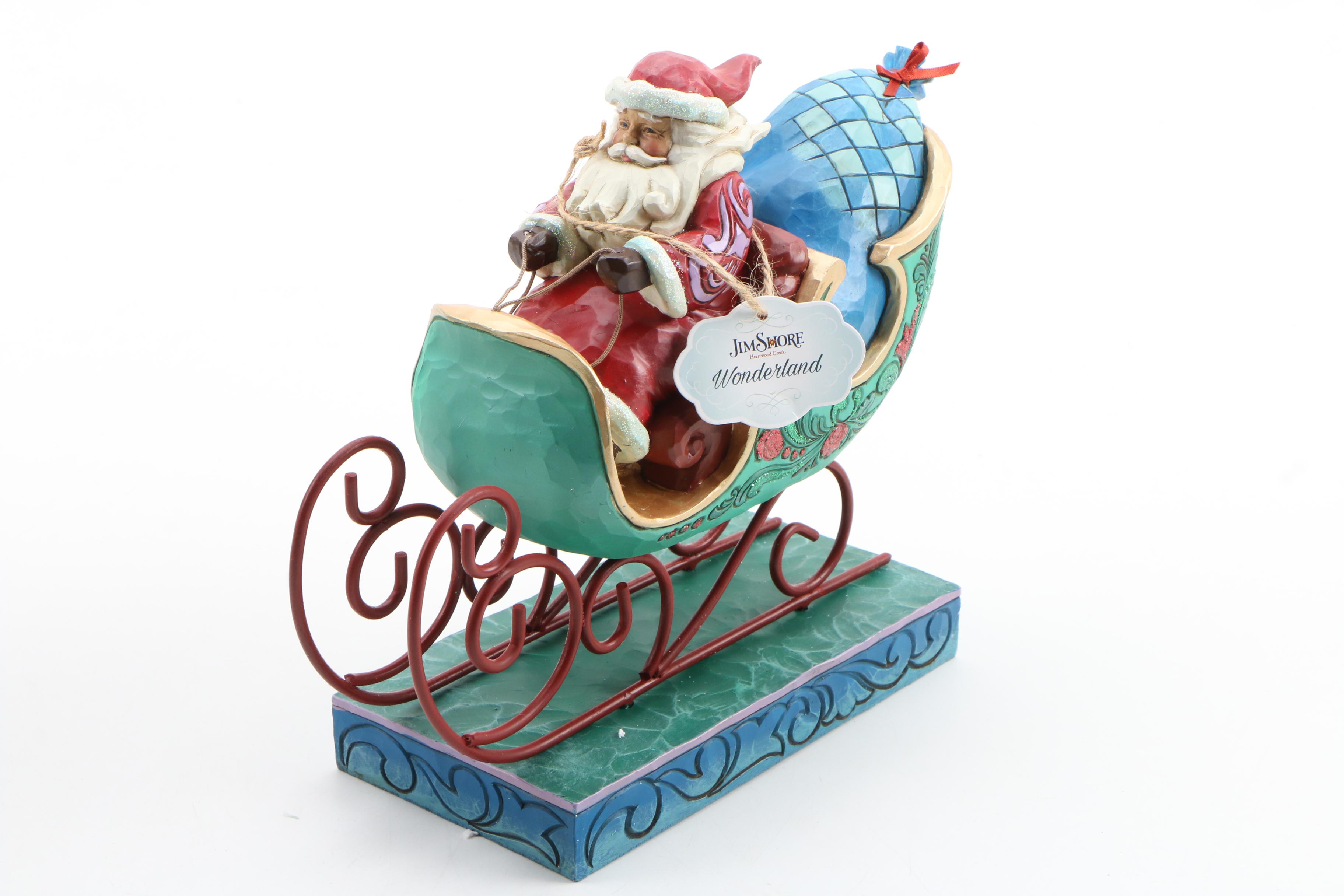 Jim Shore "Enjoy The Ride" and Brinn's Porcelain "English Garden" Santa Doll