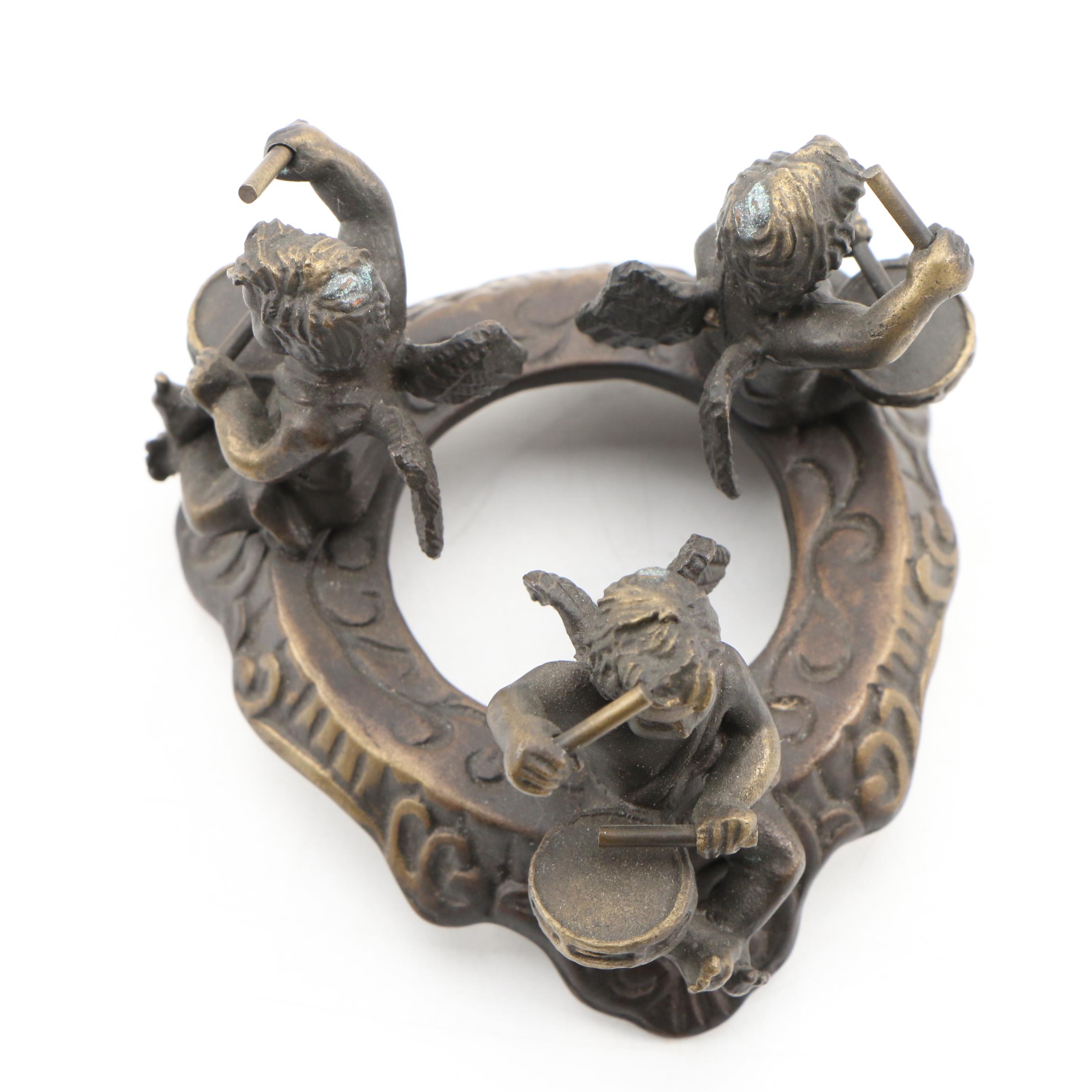 Cast Metal Dragon Figurine and Putti Base