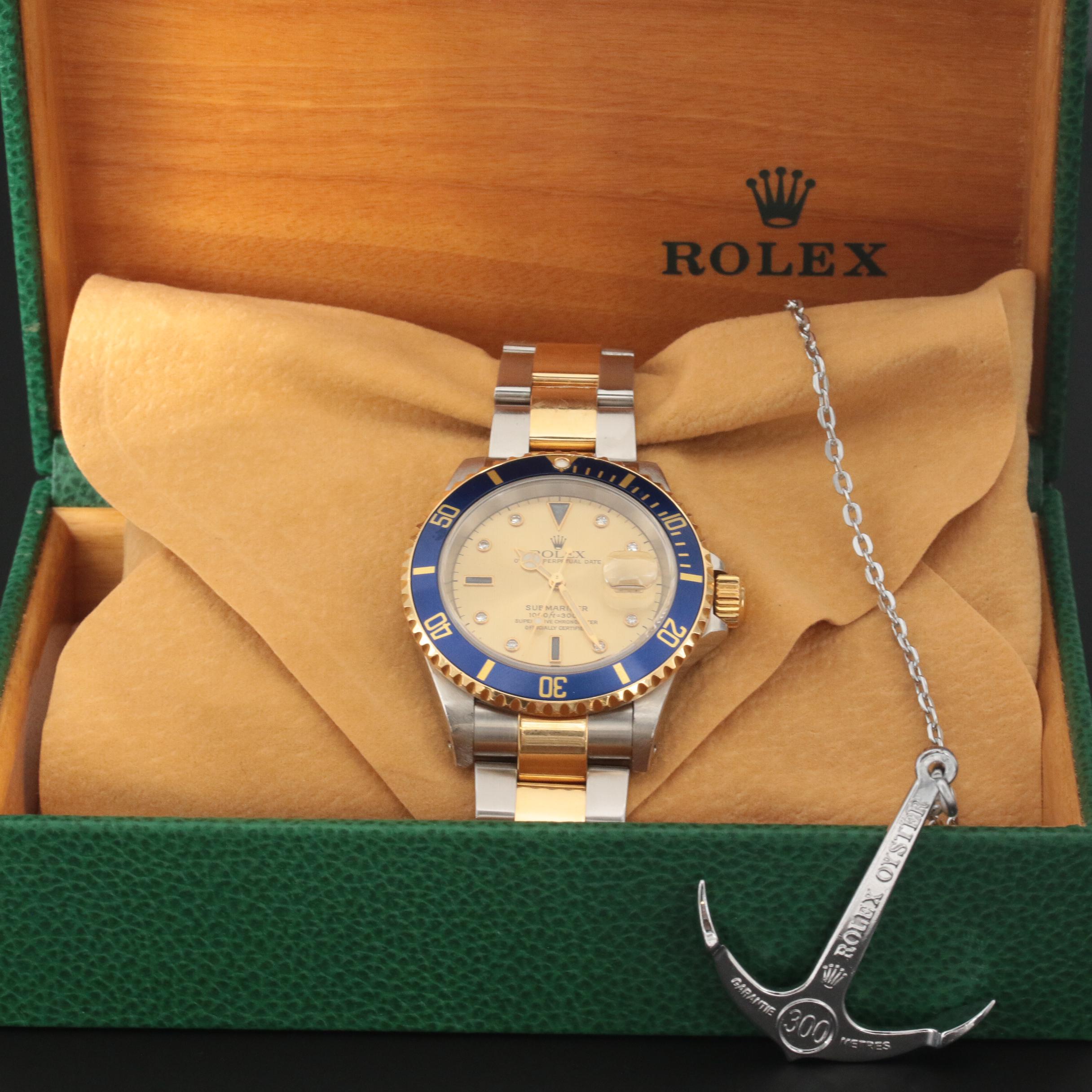 Rolex 18K Submariner Sapphire and Diamond Watch with Serti Dial, 1999