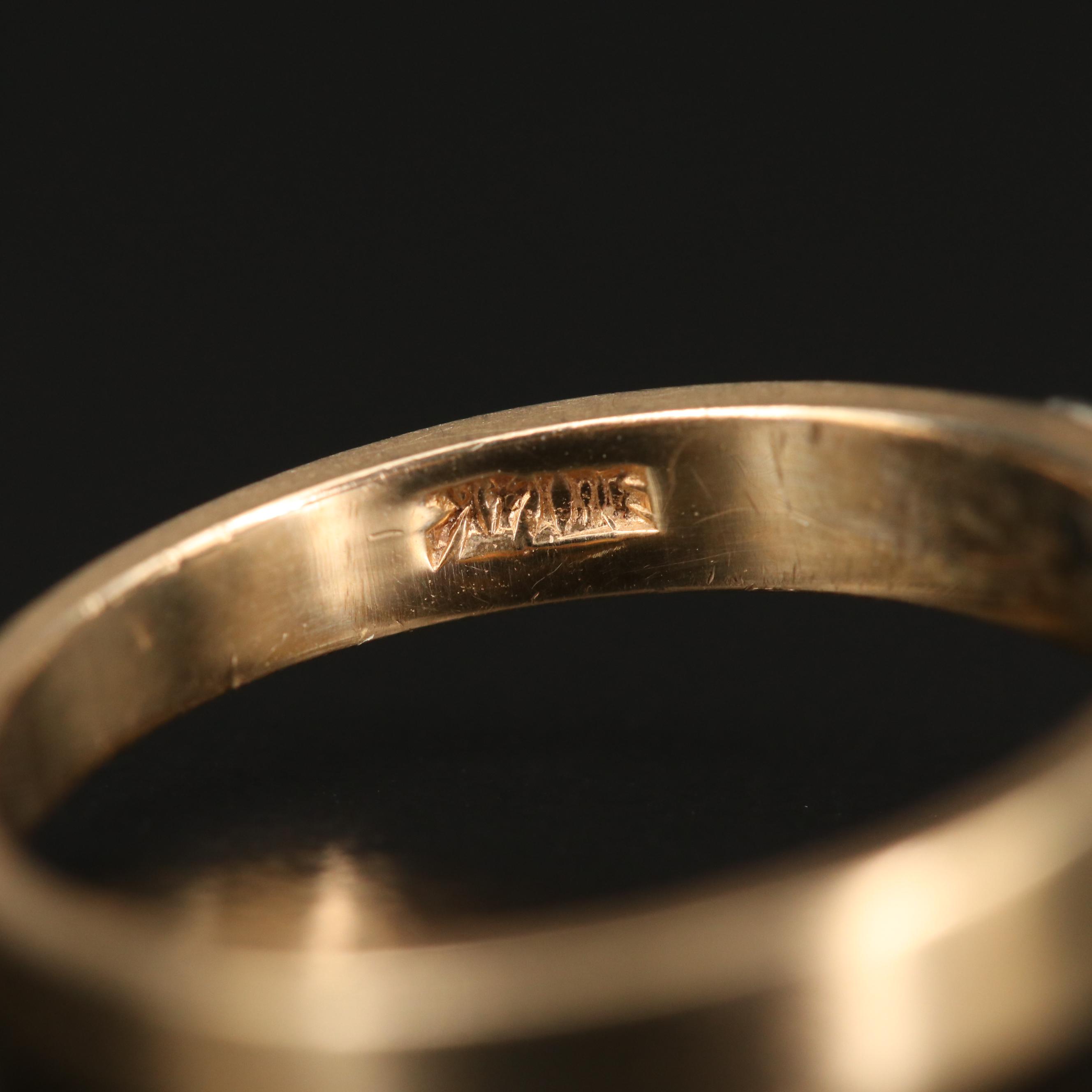 14K Gold Diamond Ring Accented by a Trio of Emeralds