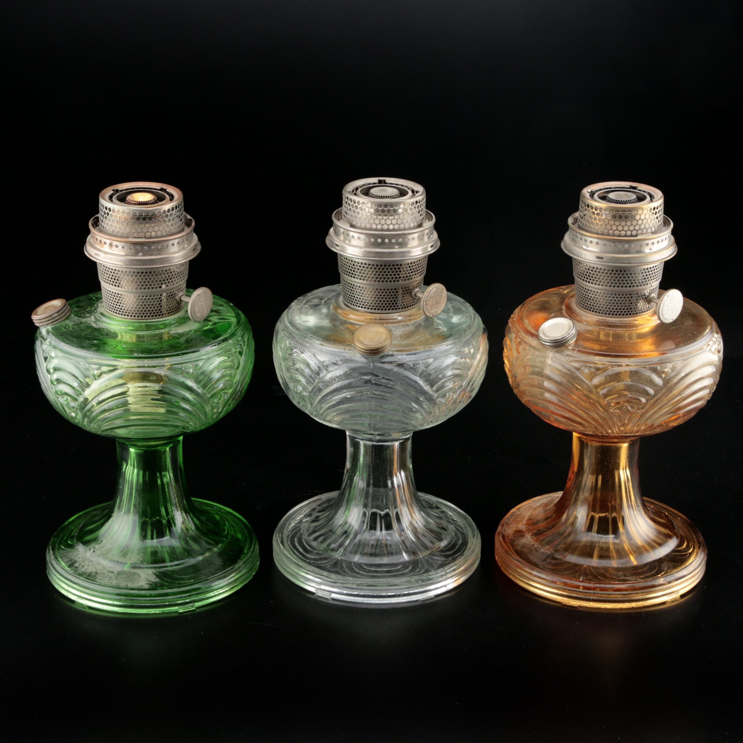 Aladdin Model B "Washington Drape" Clear and Colored Glass Kerosene Lamps, 1939