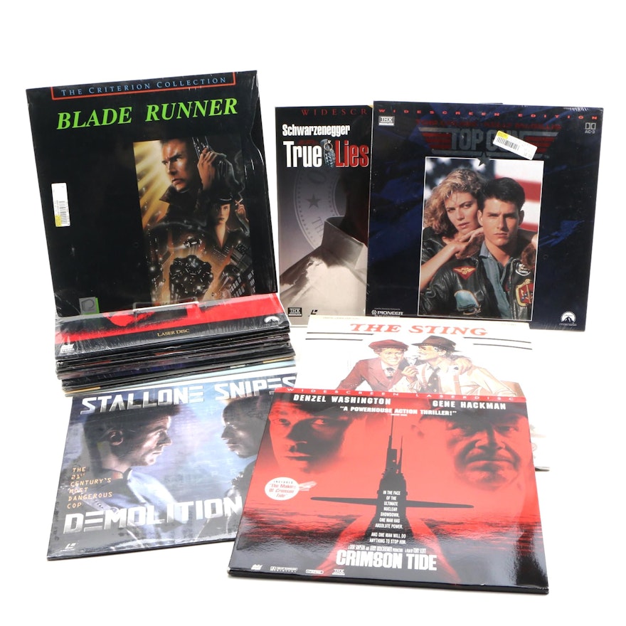 Laser Video Discs "The Sting," "Top Gun," "Total Recall," and "True Lies"