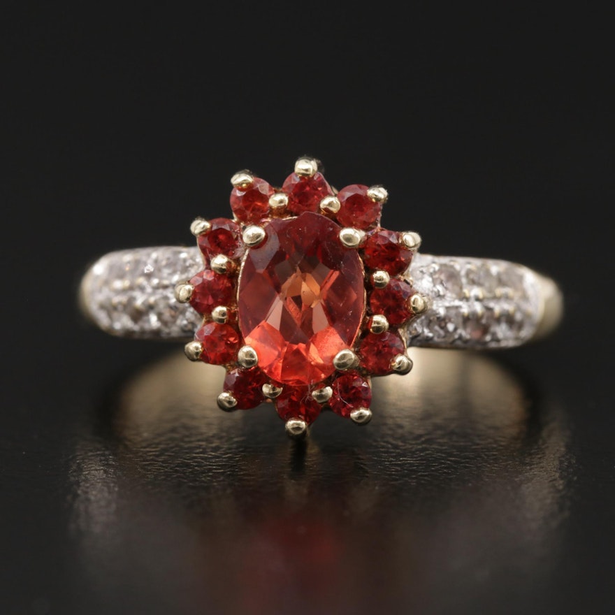 10K Yellow Gold Garnet Ring with Topaz Halo and Sapphire Lined Shoulders