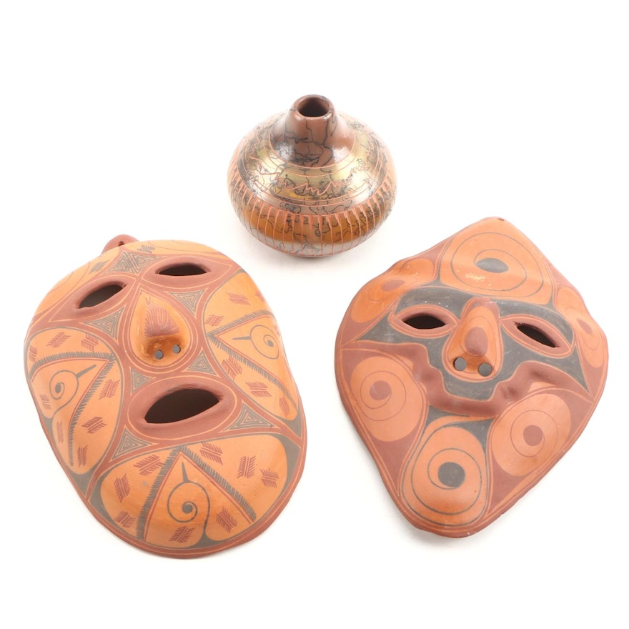 Terracotta Southwestern Style Masks with Horsehair Bud Vase Late 20th Century