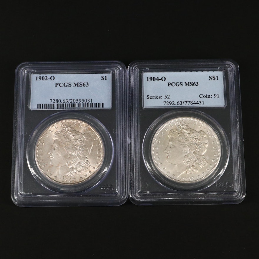 Two PCGS Graded MS63 Silver Morgan Dollars Including a 1902-O and 1904-O