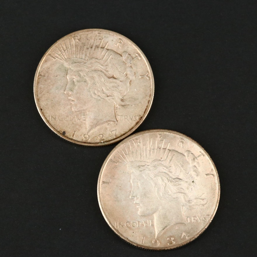 Two Silver Peace Dollars Including a 1927-D and 1934-D