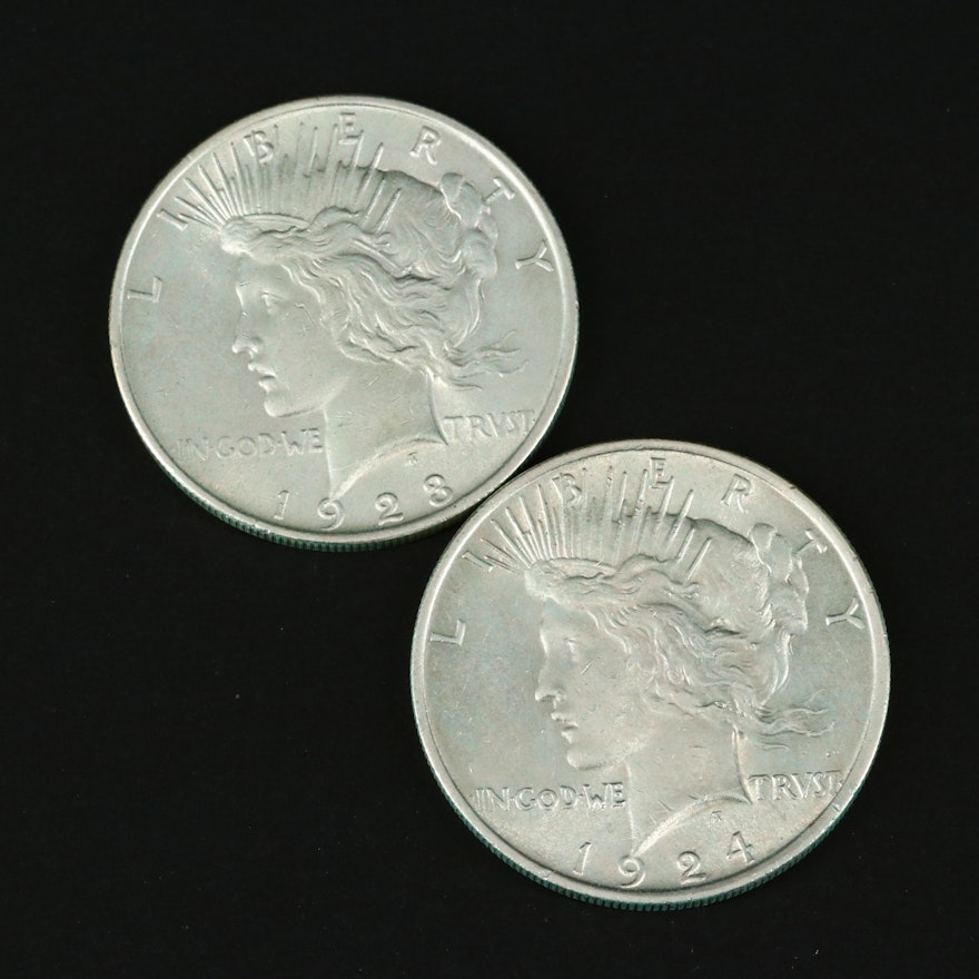 Two Silver Peace Dollars Including a 1923 and 1924