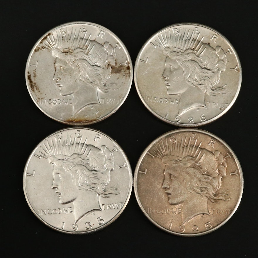 1925, 1926-D, 1926-S and 1935 Peace silver dollars