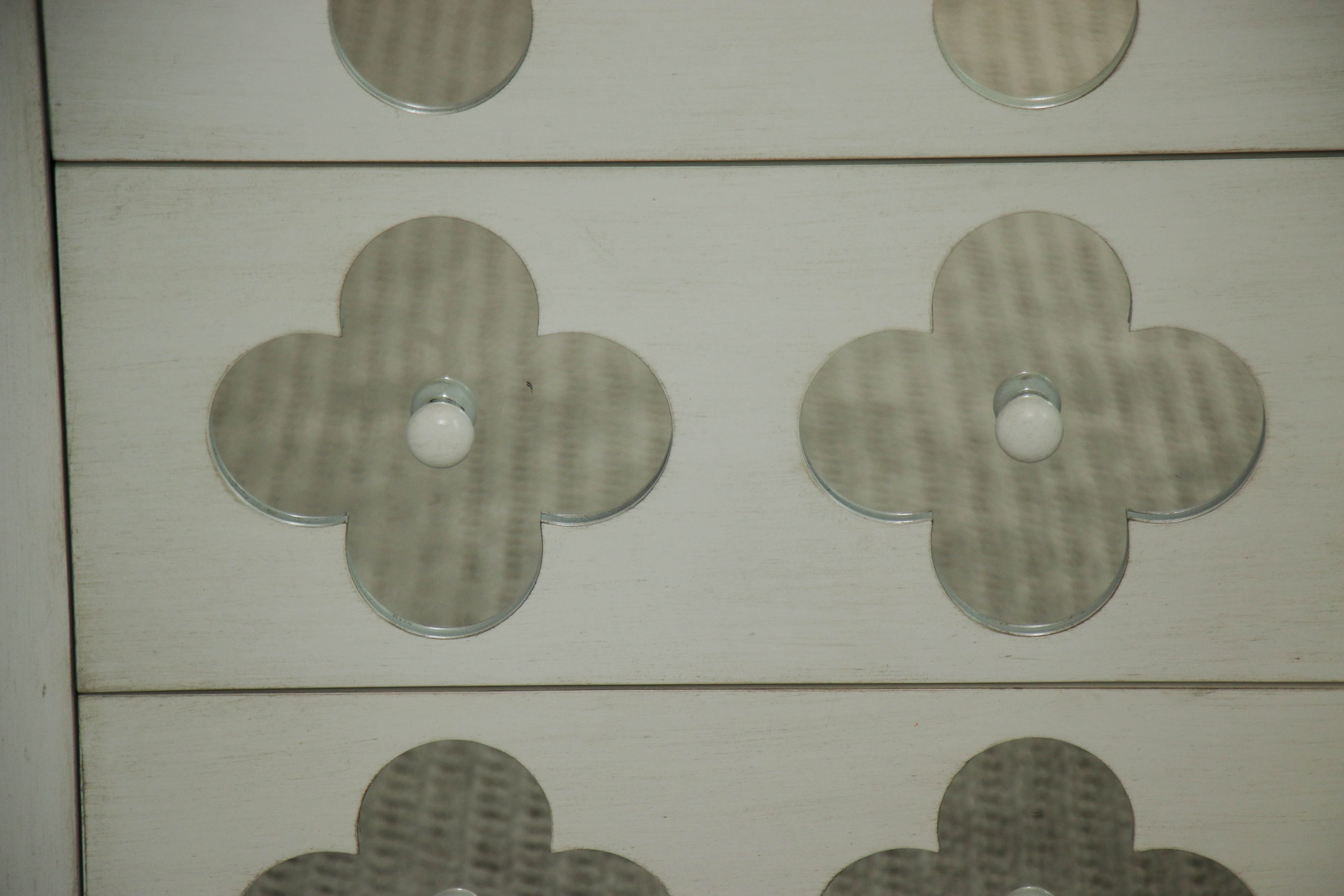 White Wooden Dresser with Mirrored Floral Fronts