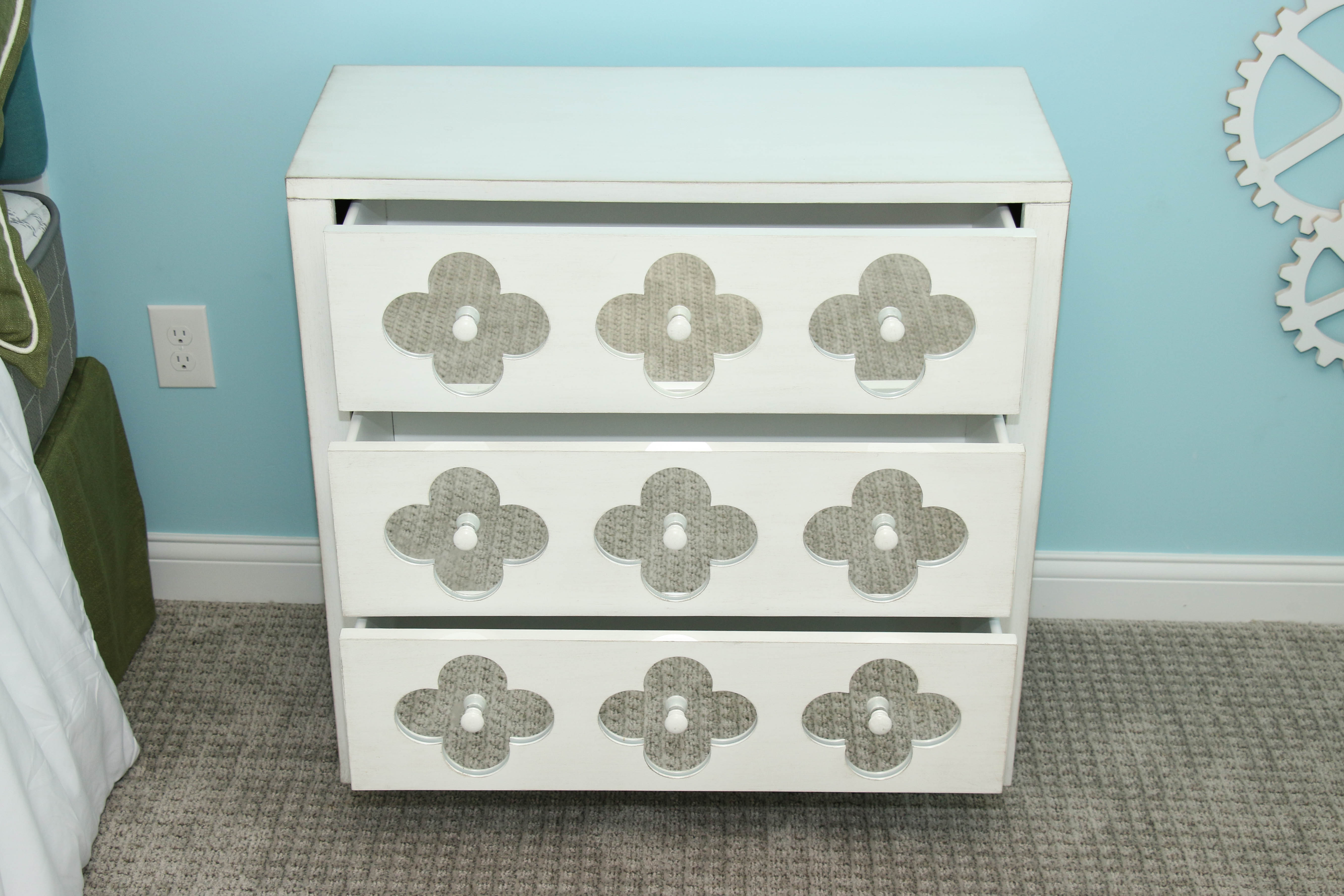 White Wooden Dresser with Mirrored Floral Fronts