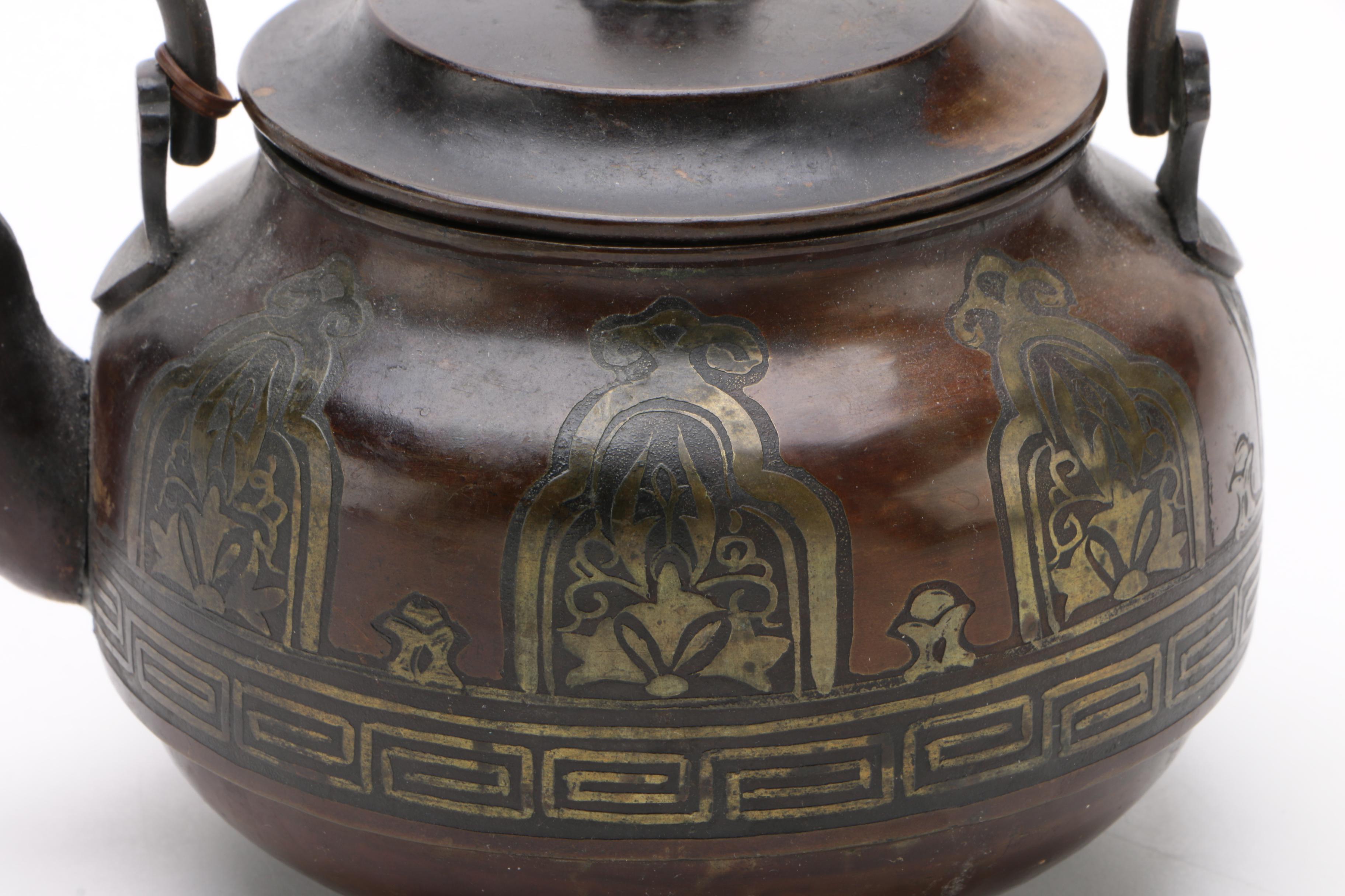 Bronze Tone Teapot With Brass Inlay and Reed Wrapped Handle