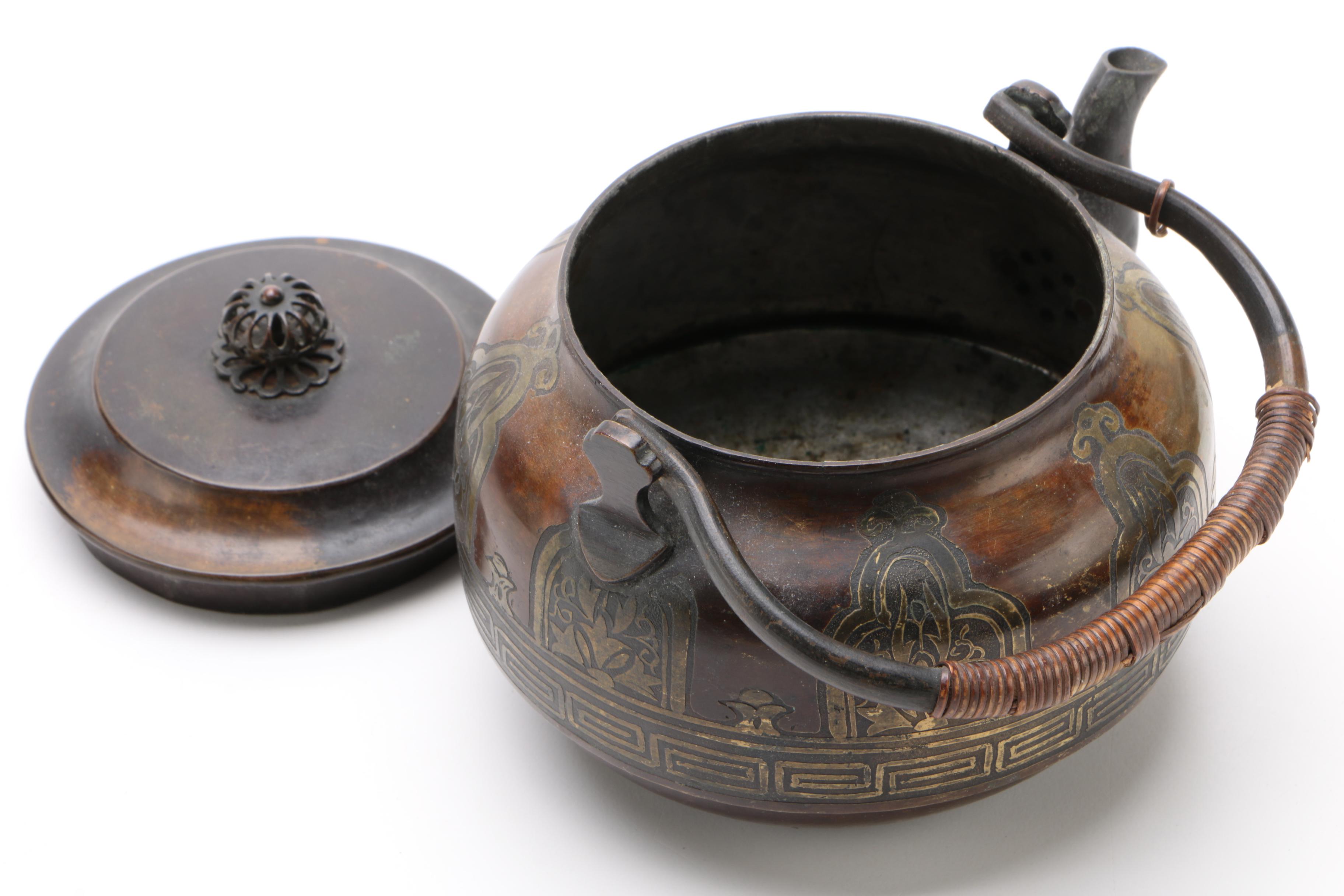 Bronze Tone Teapot With Brass Inlay and Reed Wrapped Handle