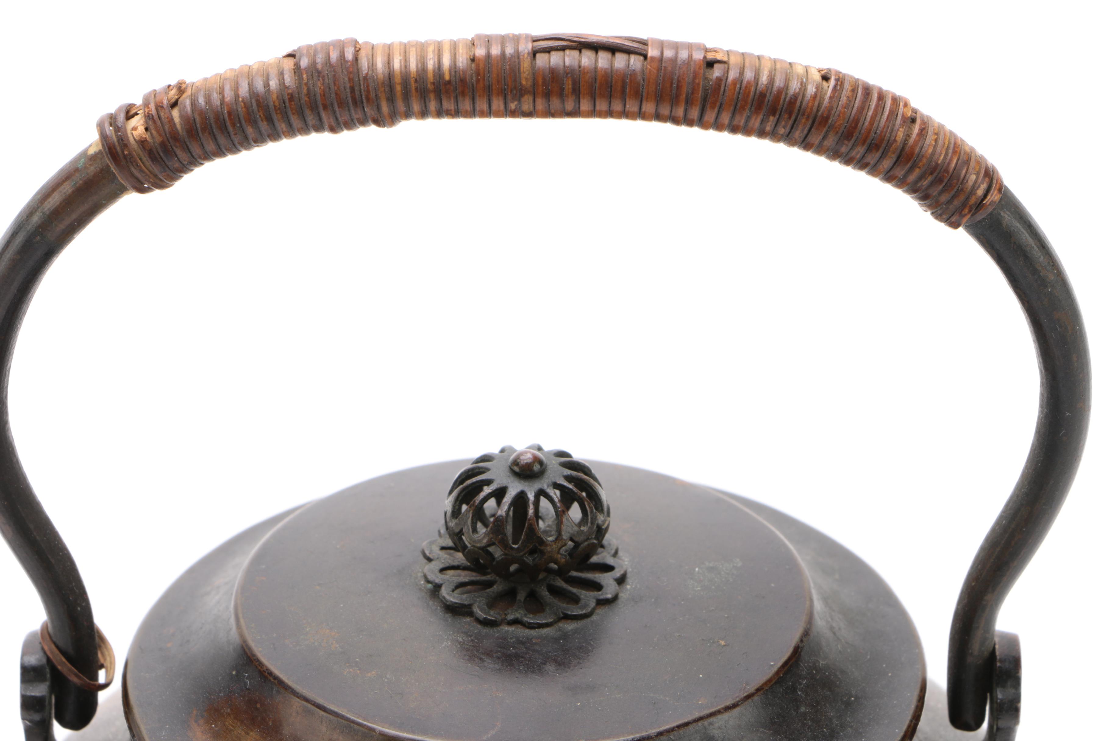 Bronze Tone Teapot With Brass Inlay and Reed Wrapped Handle