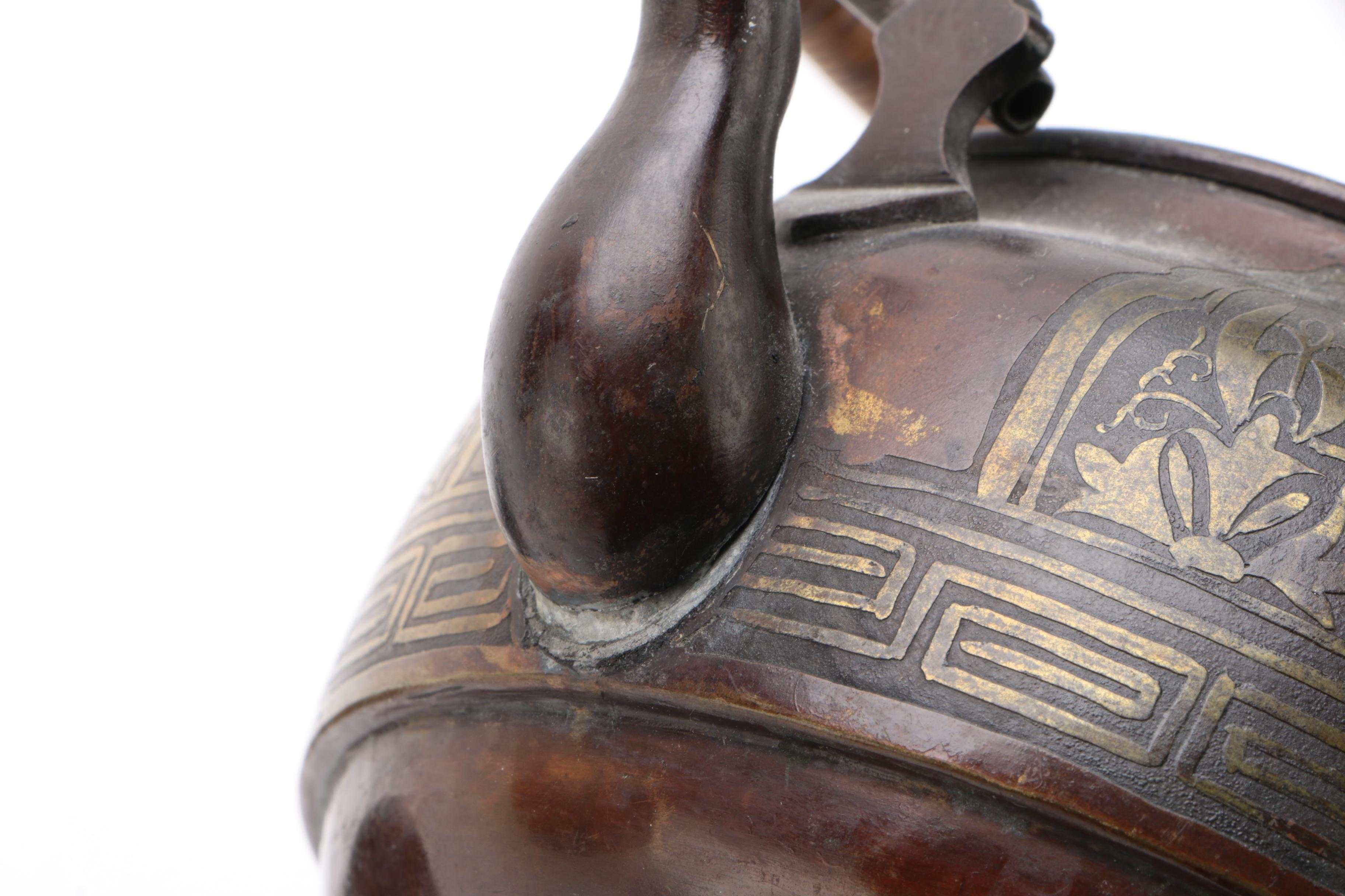 Bronze Tone Teapot With Brass Inlay and Reed Wrapped Handle