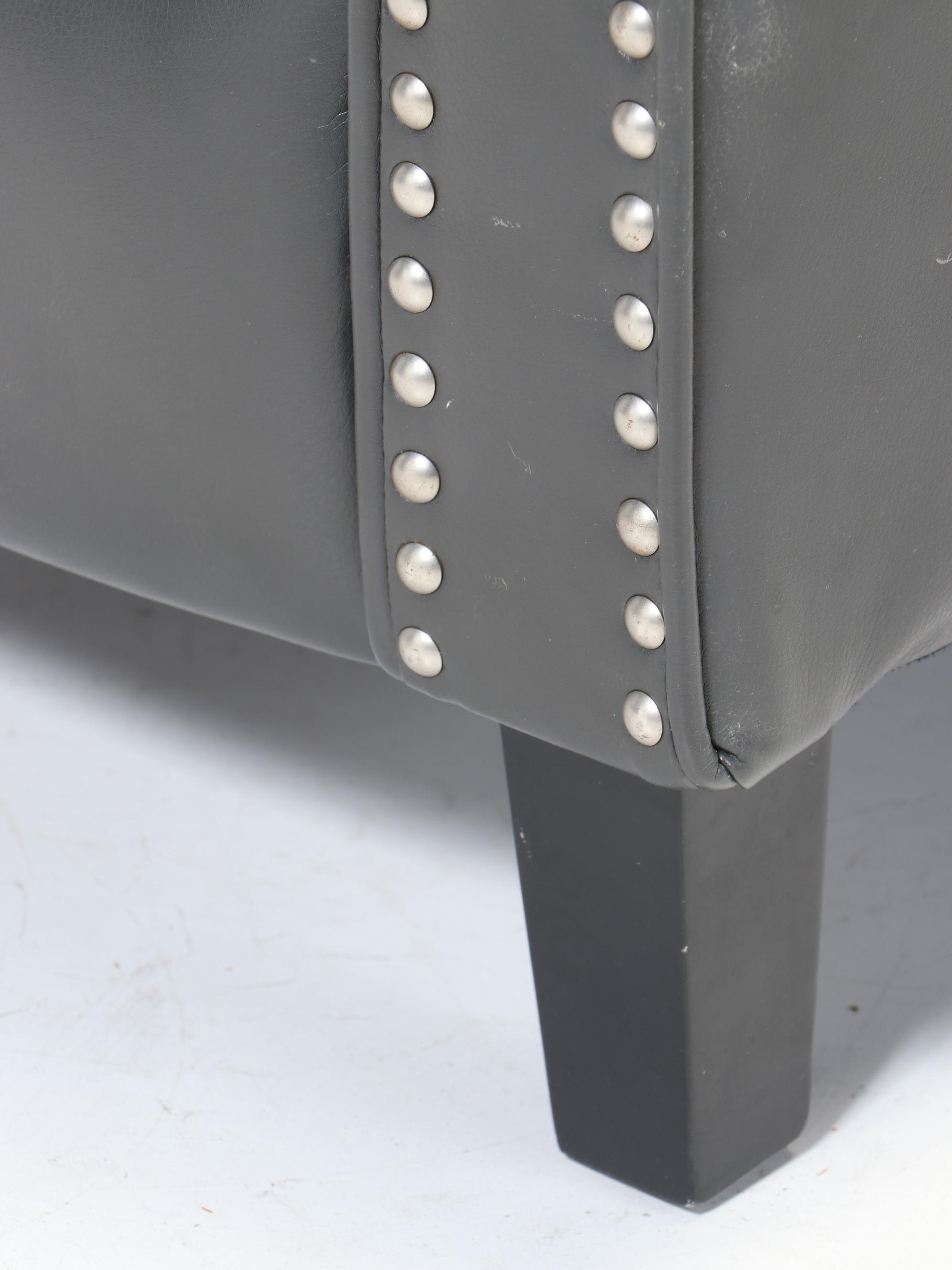 Vinyl Upholstered Recliner with Nailhead Detail