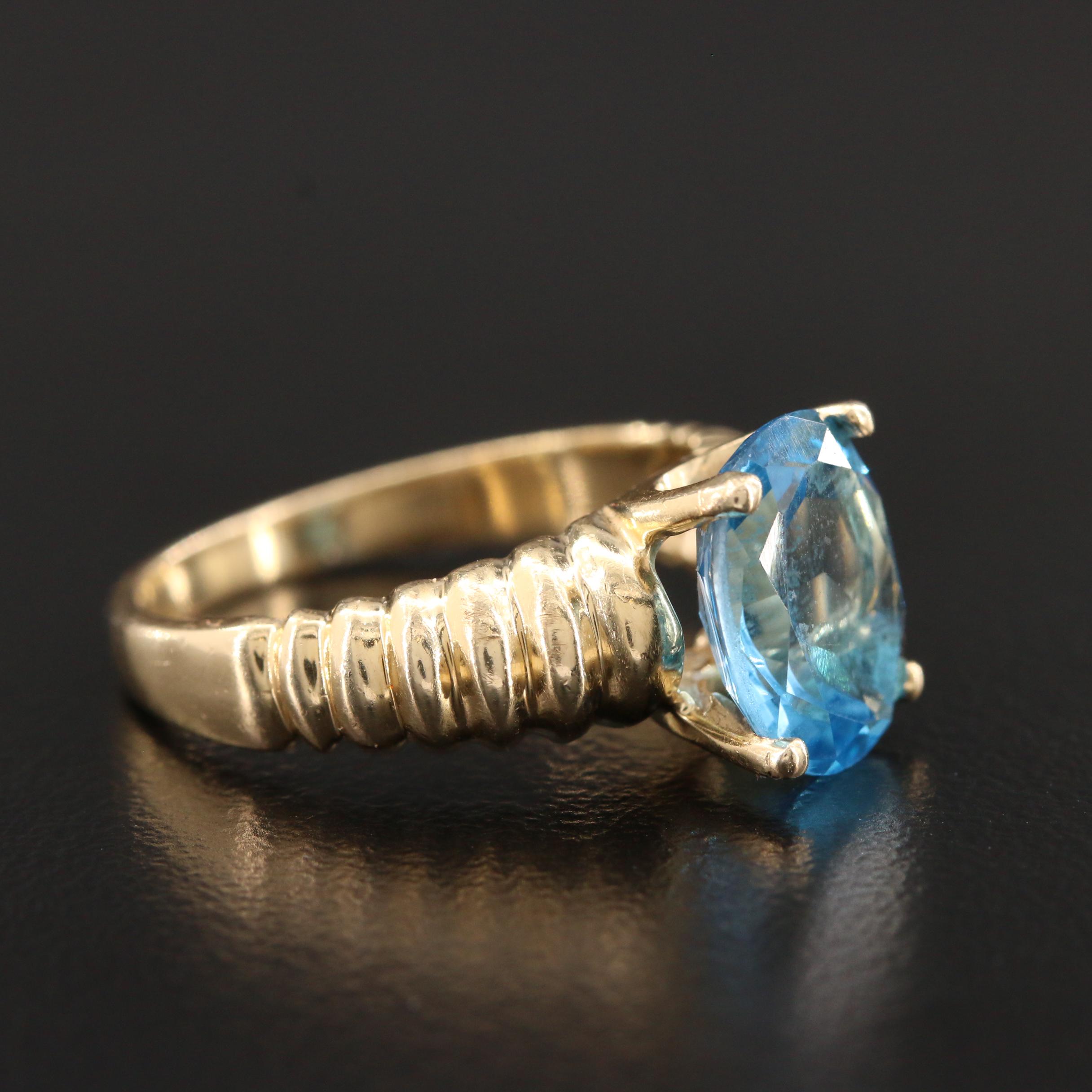 14K Yellow Gold Blue Topaz Ring