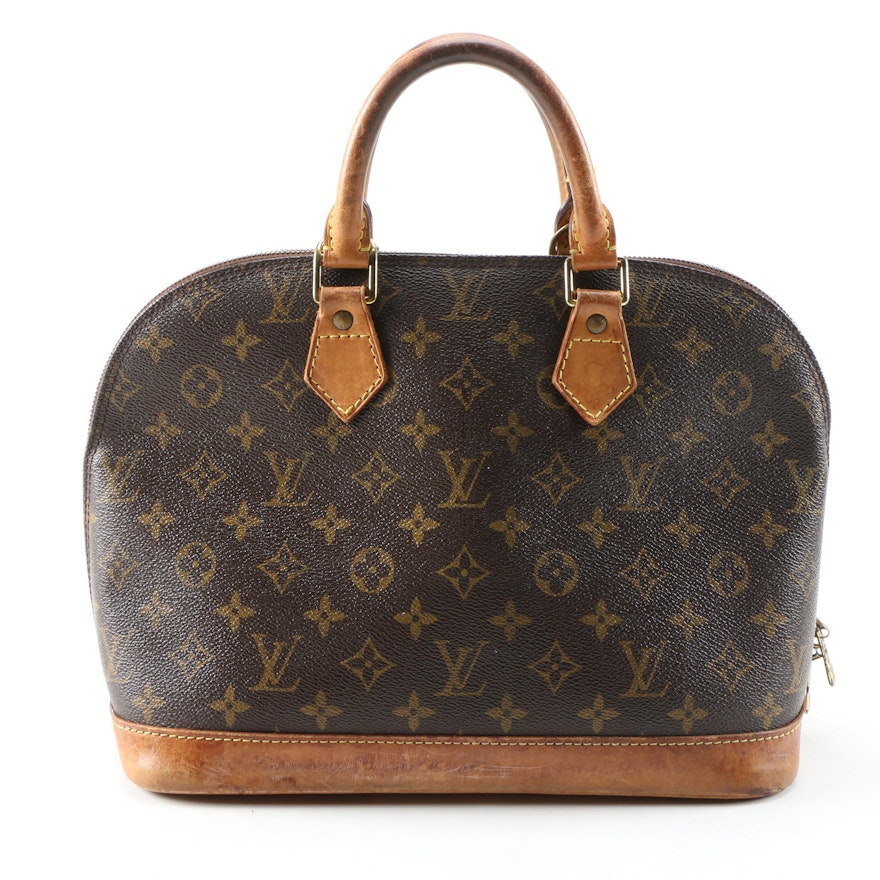 Louis Vuitton Alma Handbag in Monogram Canvas and Leather