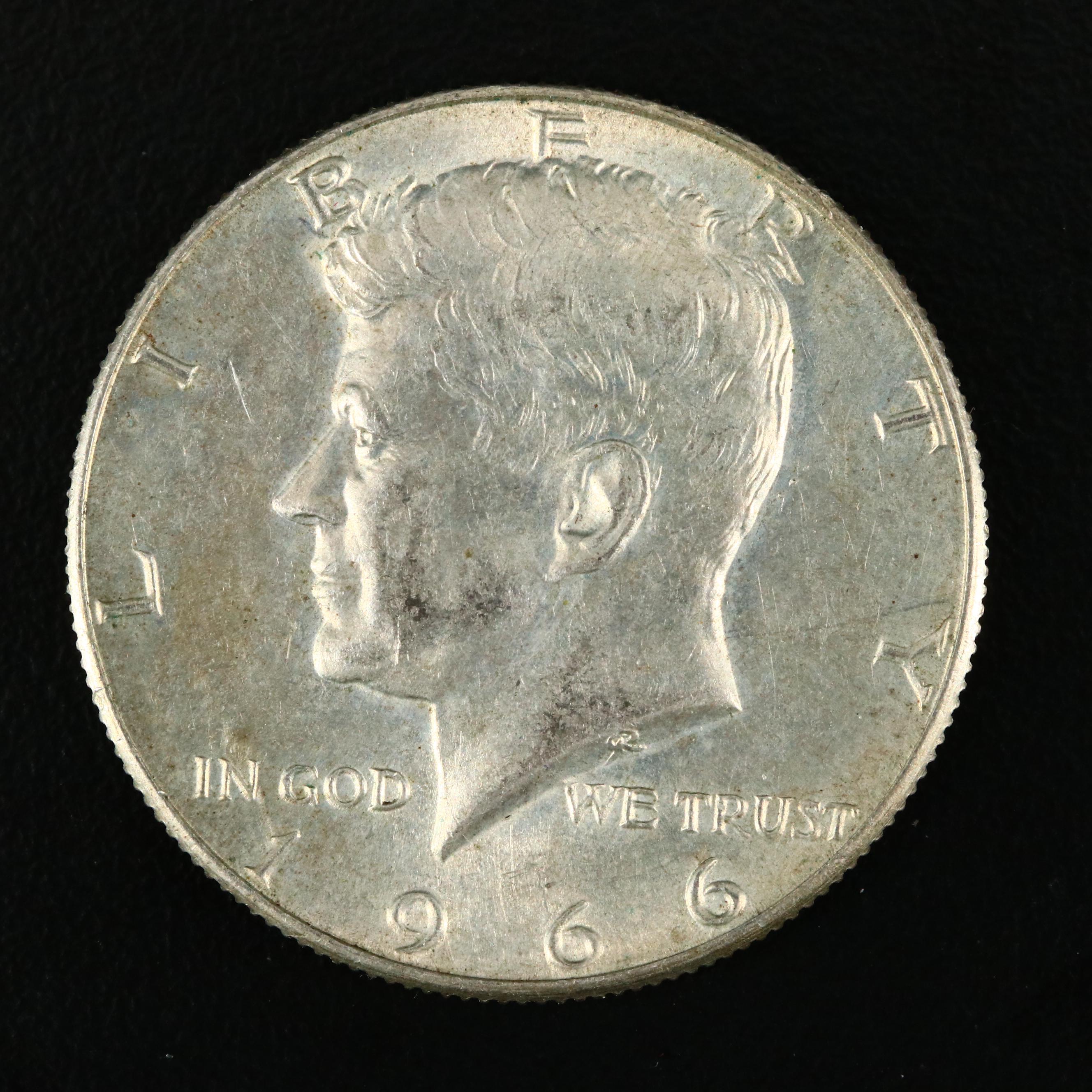 Thirty-Two JFK Silver Clad Half Dollars Ranging from 1965-1969